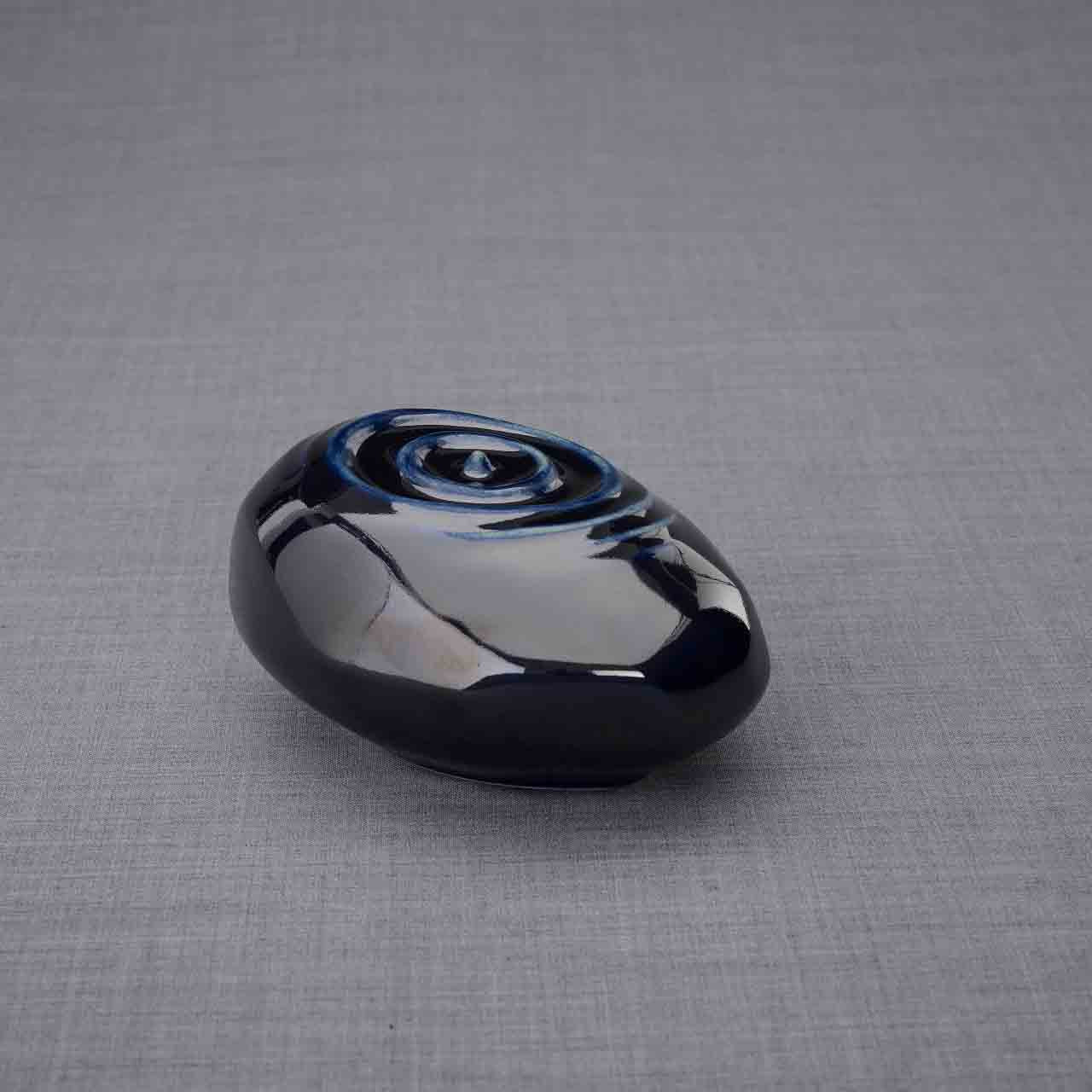 Resonance Ashes Keepsake Urn in Metallic Blue Turned Right Dark Background