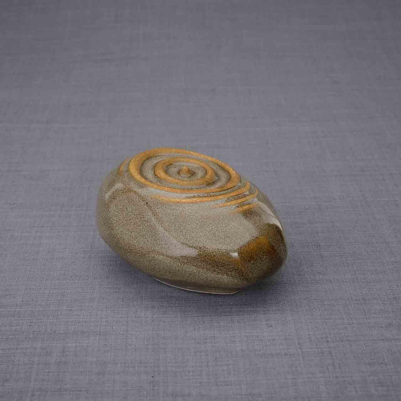 Resonance Ashes Keepsake Urn in Oily Brown Facing Left Dark Background