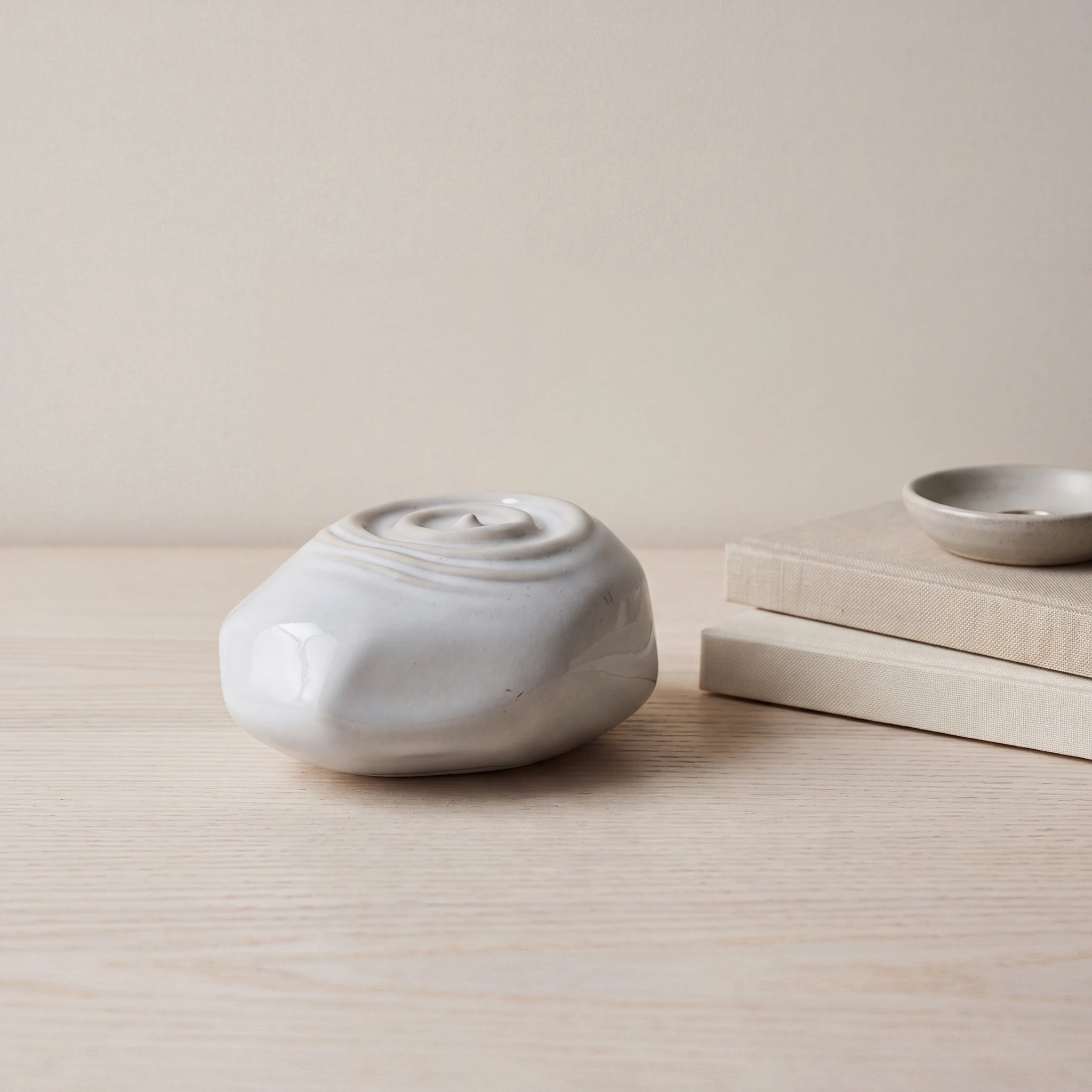 Ripples-Small-Urn-for-Ashes-in-Grey-keepsake_books_dish-Left-Angle