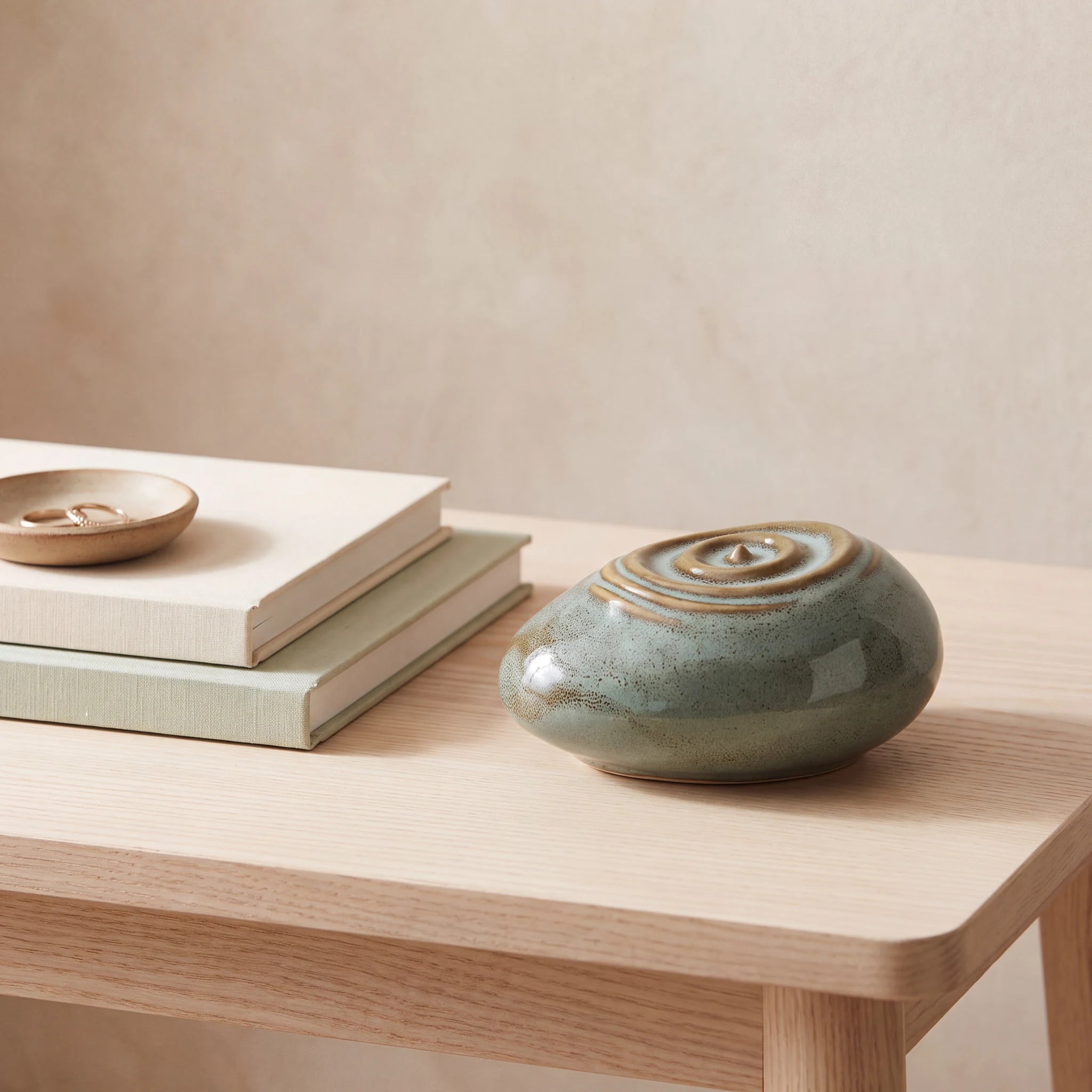 Ripples-Small-Urn-for-Ashes-in-Oily-Green-keepsake_books_dish-Left-Angle