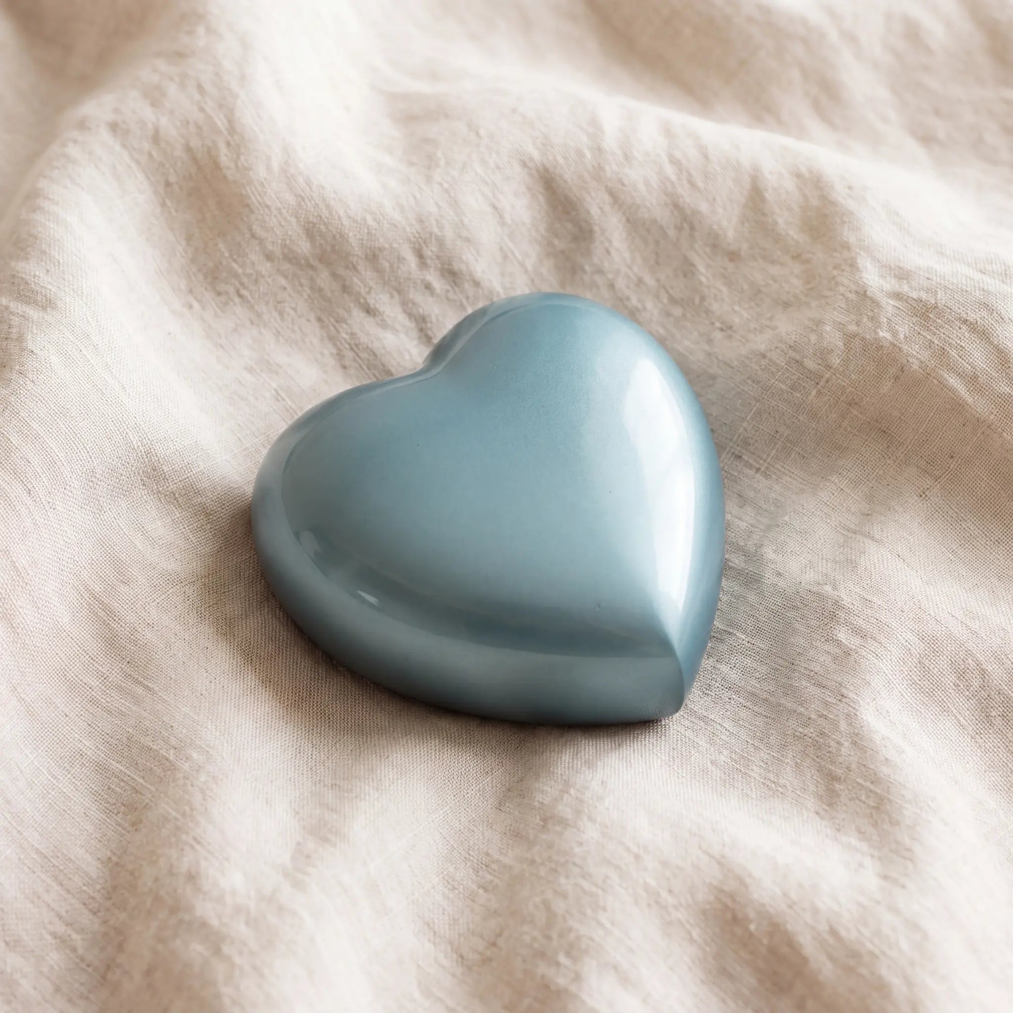 Satori-Metal-Heart-Keepsake-Urn-for-Ashes-in-Blue-On-Linen
