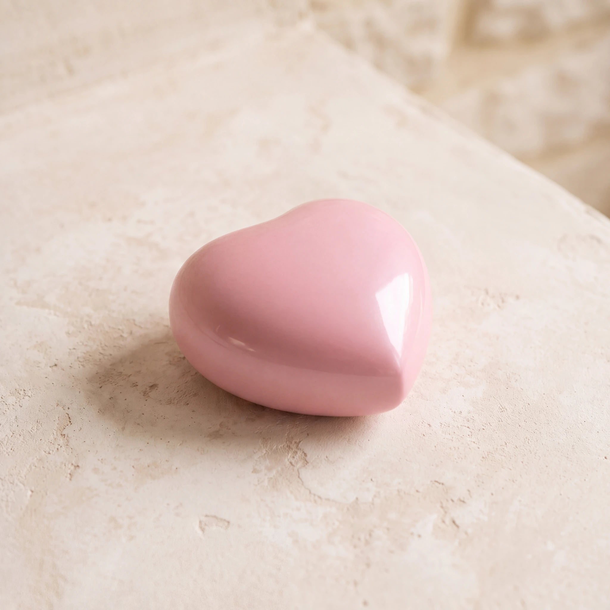 Satori-Metal-Heart-Keepsake-Urn-for-Ashes-in-Soft-Pink-heart_plaster_above