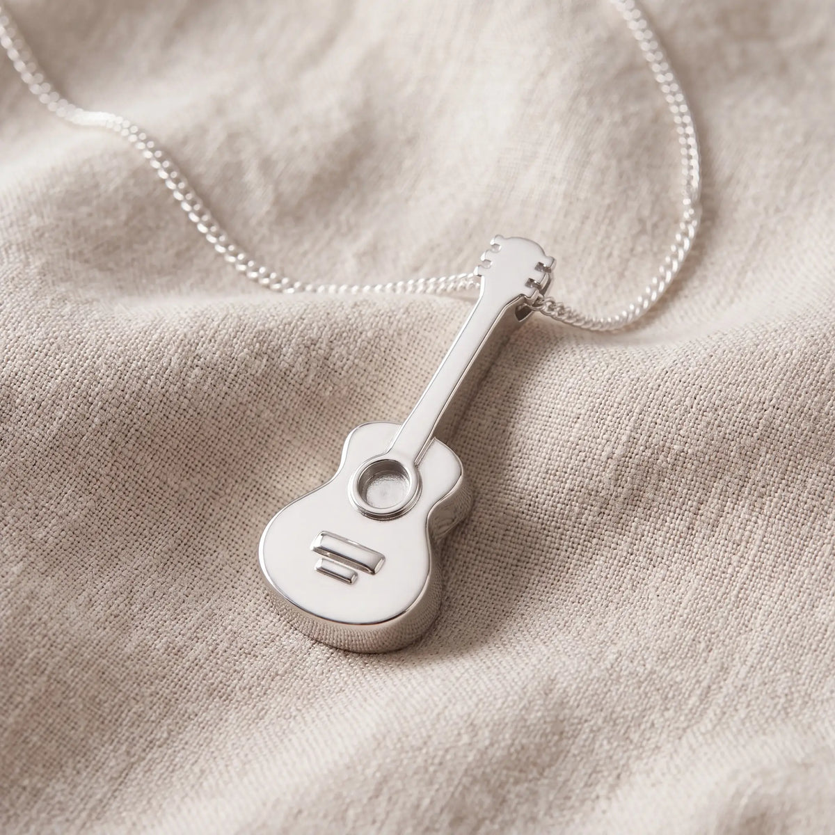 Self-fill-Acoustic-Guitar-Memorial-Ashes-Pendant-On-Linen