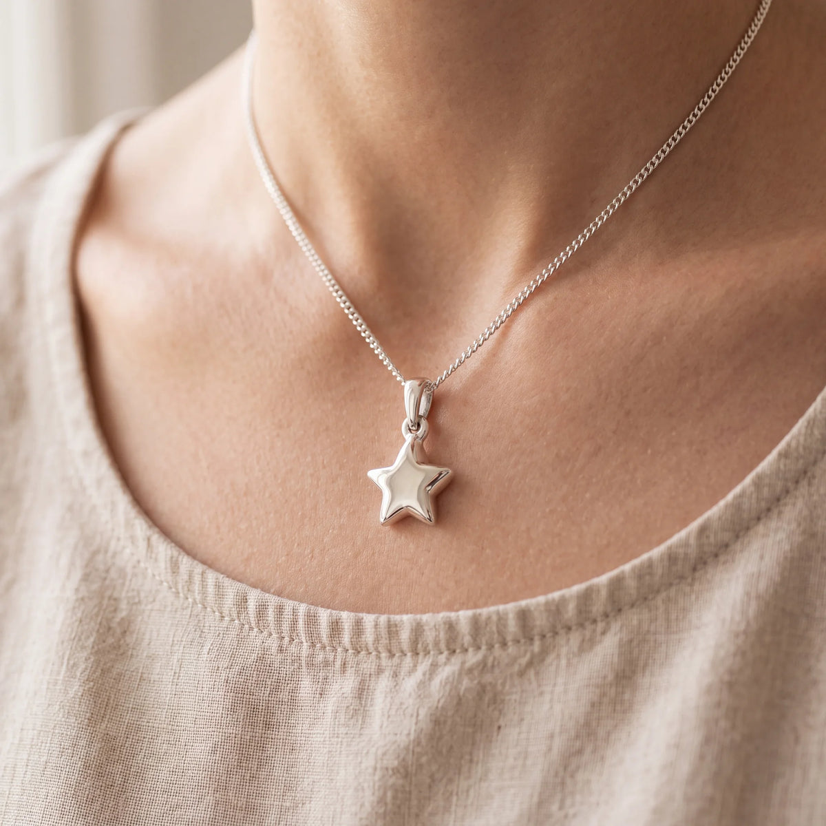 Self-fill-Classic-Star-Memorial-Ashes-Pendant-Worn
