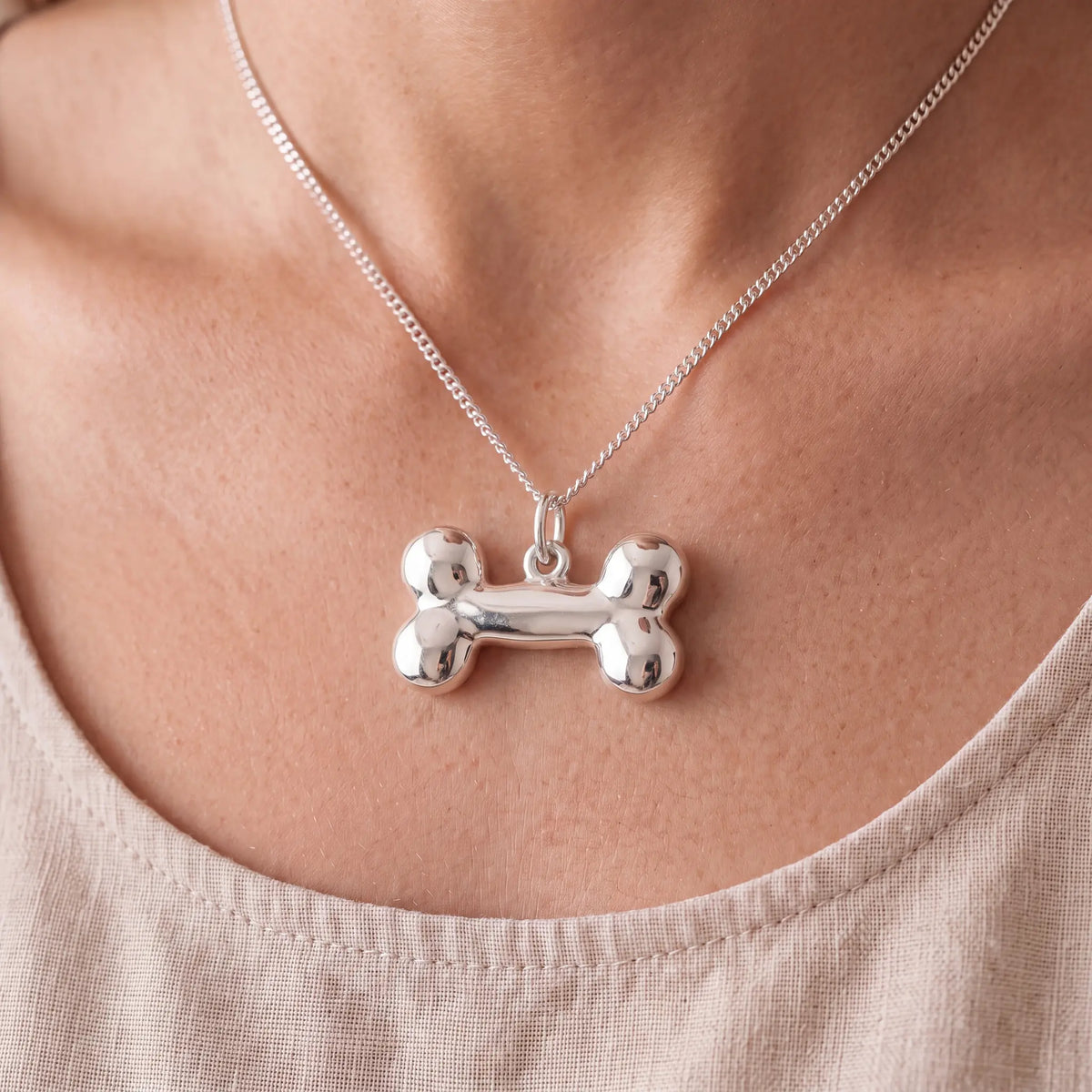 Self-fill-Dog-Bone-Memorial-Ashes-Pendant-Worn
