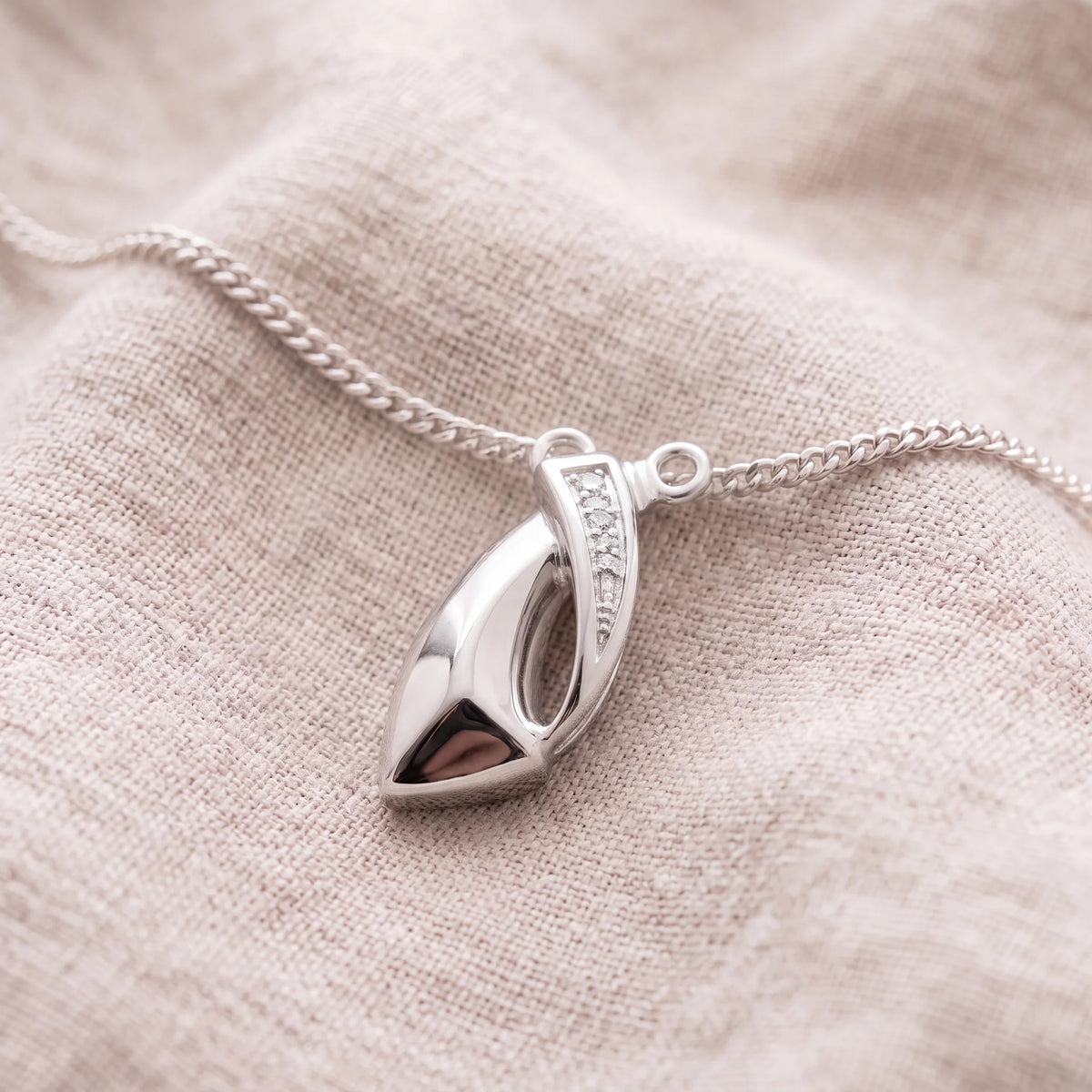 Self-fill-Harmony-Memorial-Ashes-Pendant-On-Linen