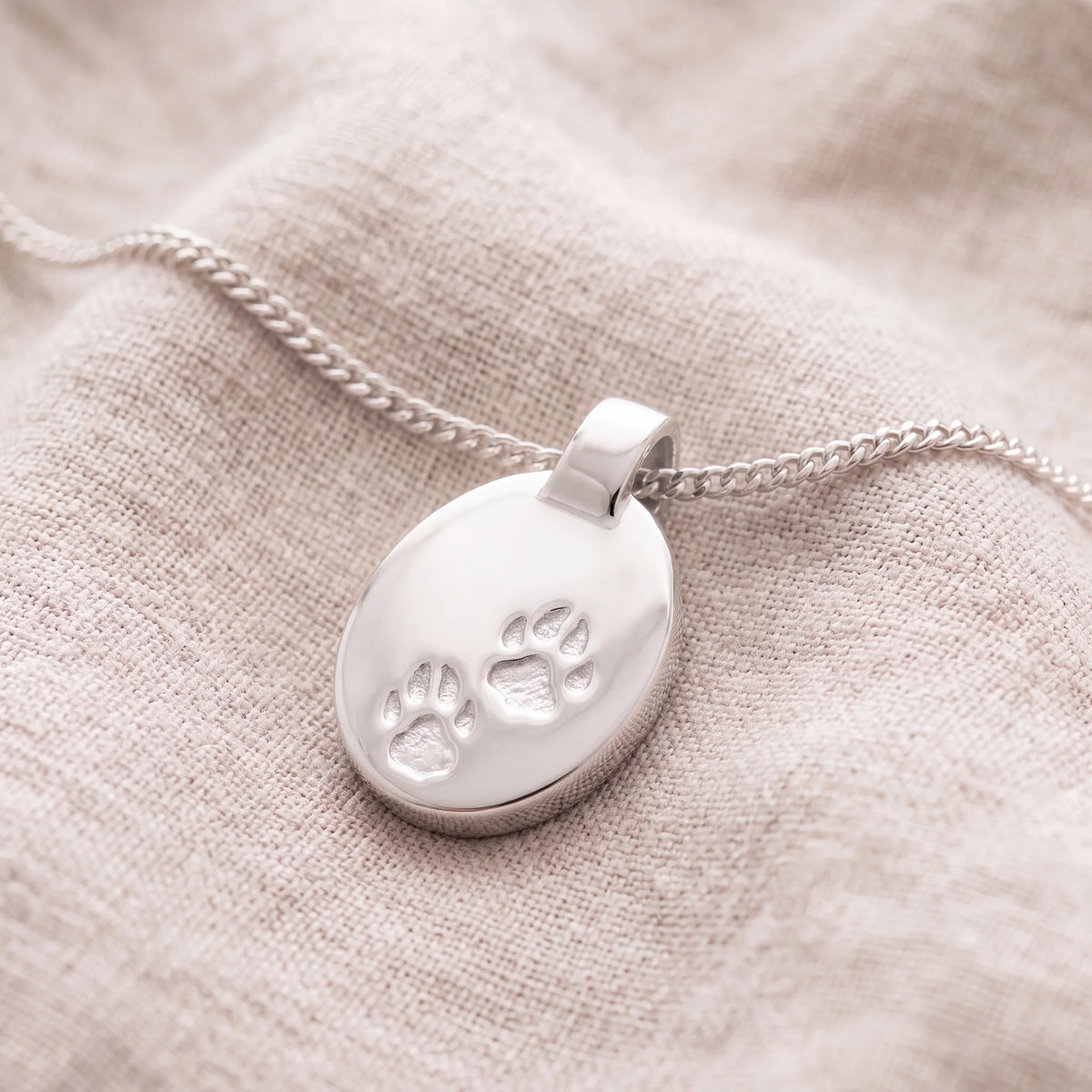 Self-fill-Paw-Print-Set-Memorial-Ashes-Pendant-On-Linen