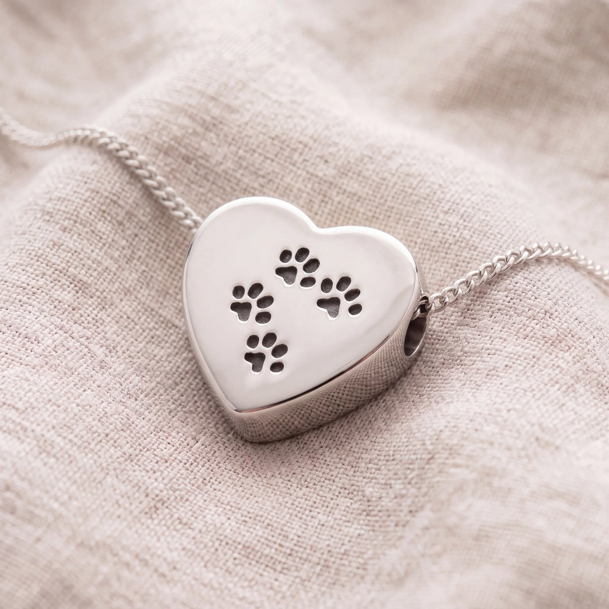 Self-fill-Paw-Prints-Heart-Memorial-Ashes-Pendant-On-Linen