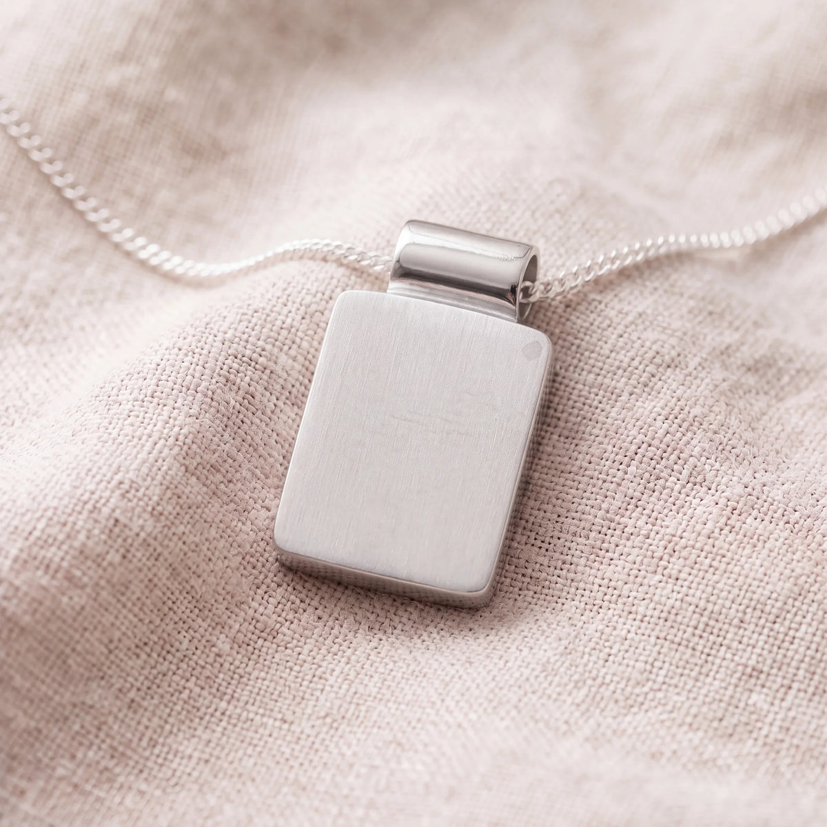 Self-fill-Rectangular-Memorial-Pet-Ashes-Pendant-On-Linen