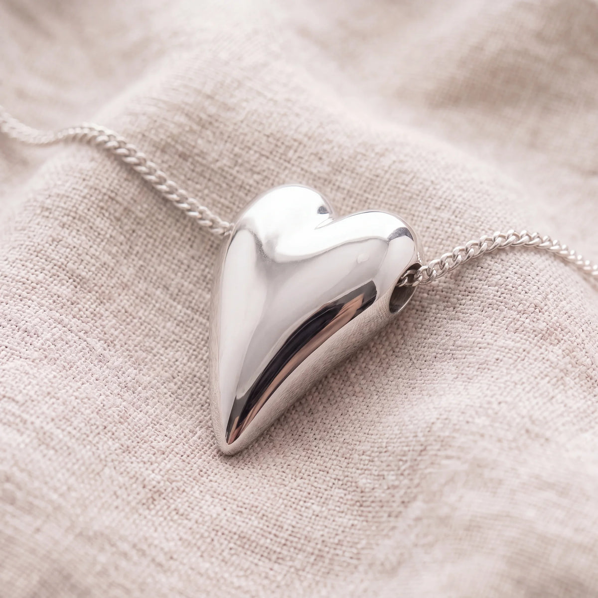 Self-fill-Tall-Heart-Pet-Memorial-Ashes-Pendant-On-Linen