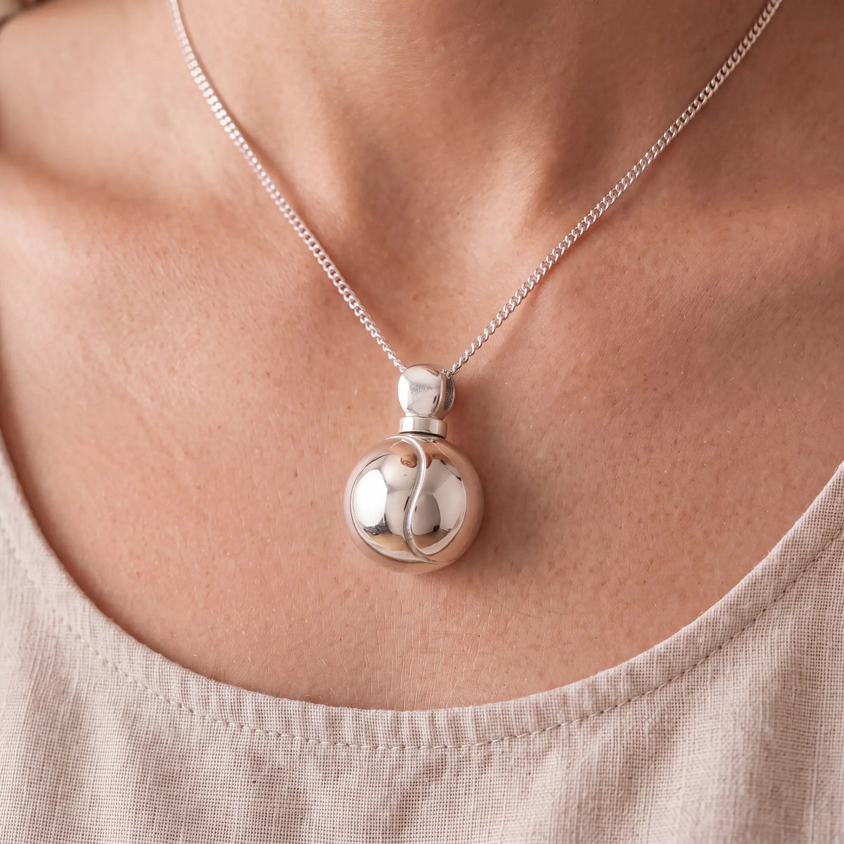 Self-fill-Tennis-Ball-Memorial-Ashes-Pendant-Worn