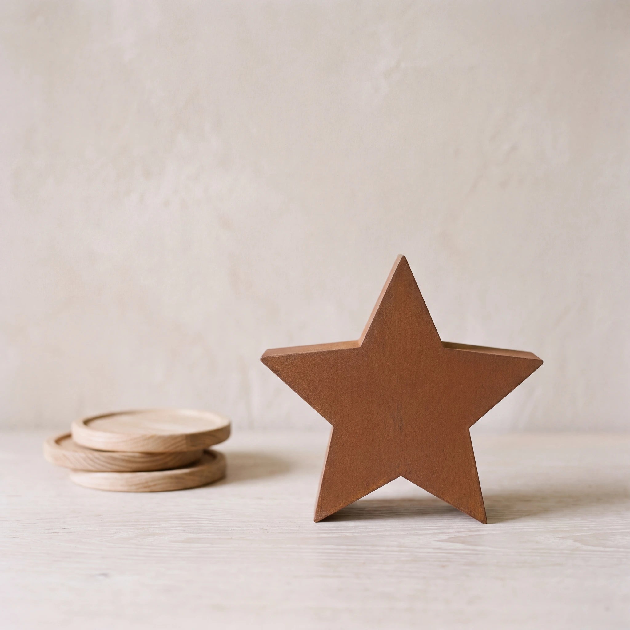 Star-Extra-Small-Urn-for-Ashes-in-Corten-Steel-keepsake_stacked_coasters
