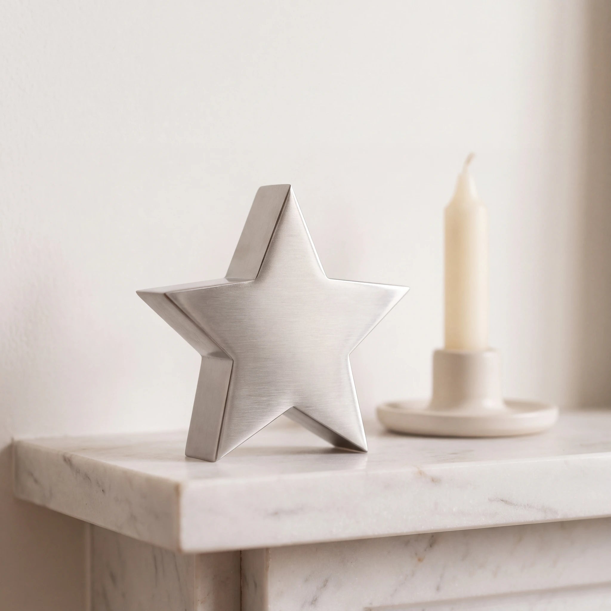 Star-Extra-Small-Urn-for-Ashes-in-Stainless-Steel-Marble-Ledge