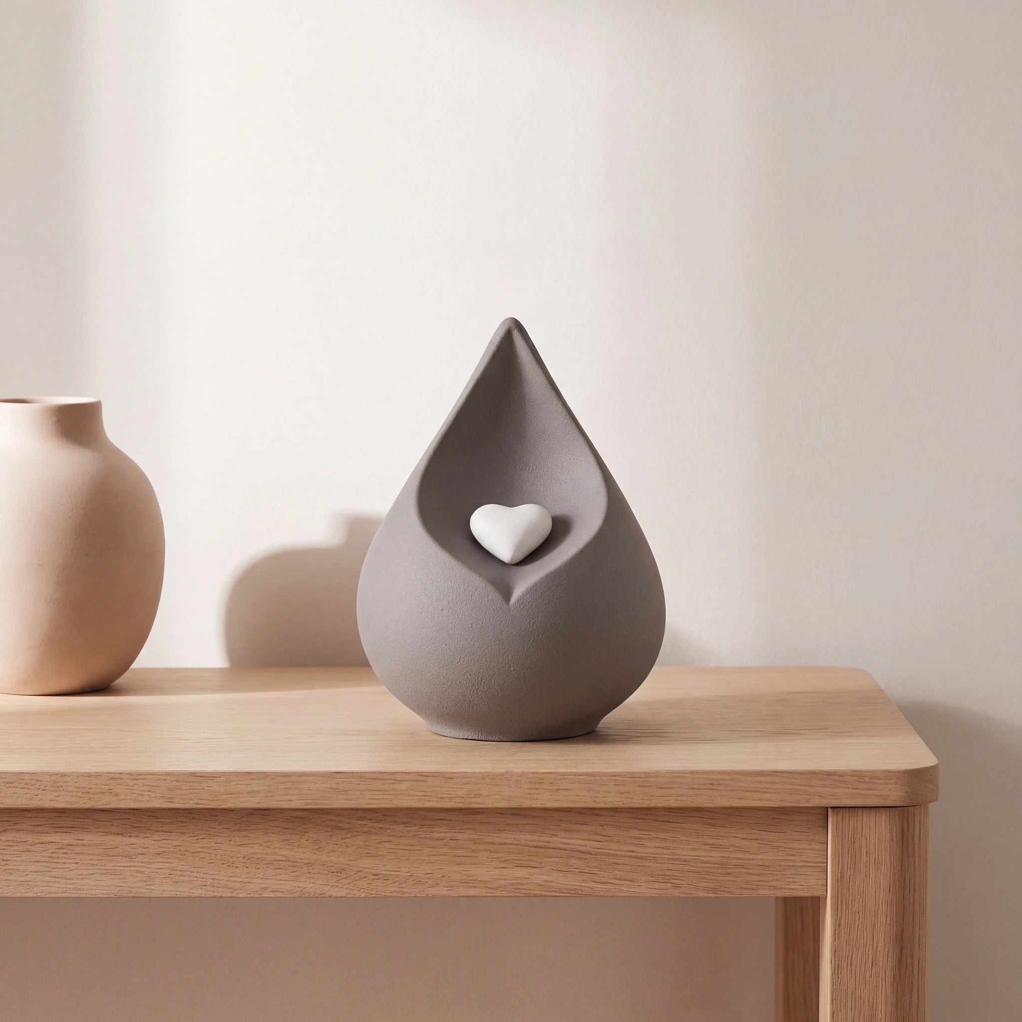 Teardrop-Medium-Urn-for-Ashes-with-Heart-in-Grey-Oak-Console
