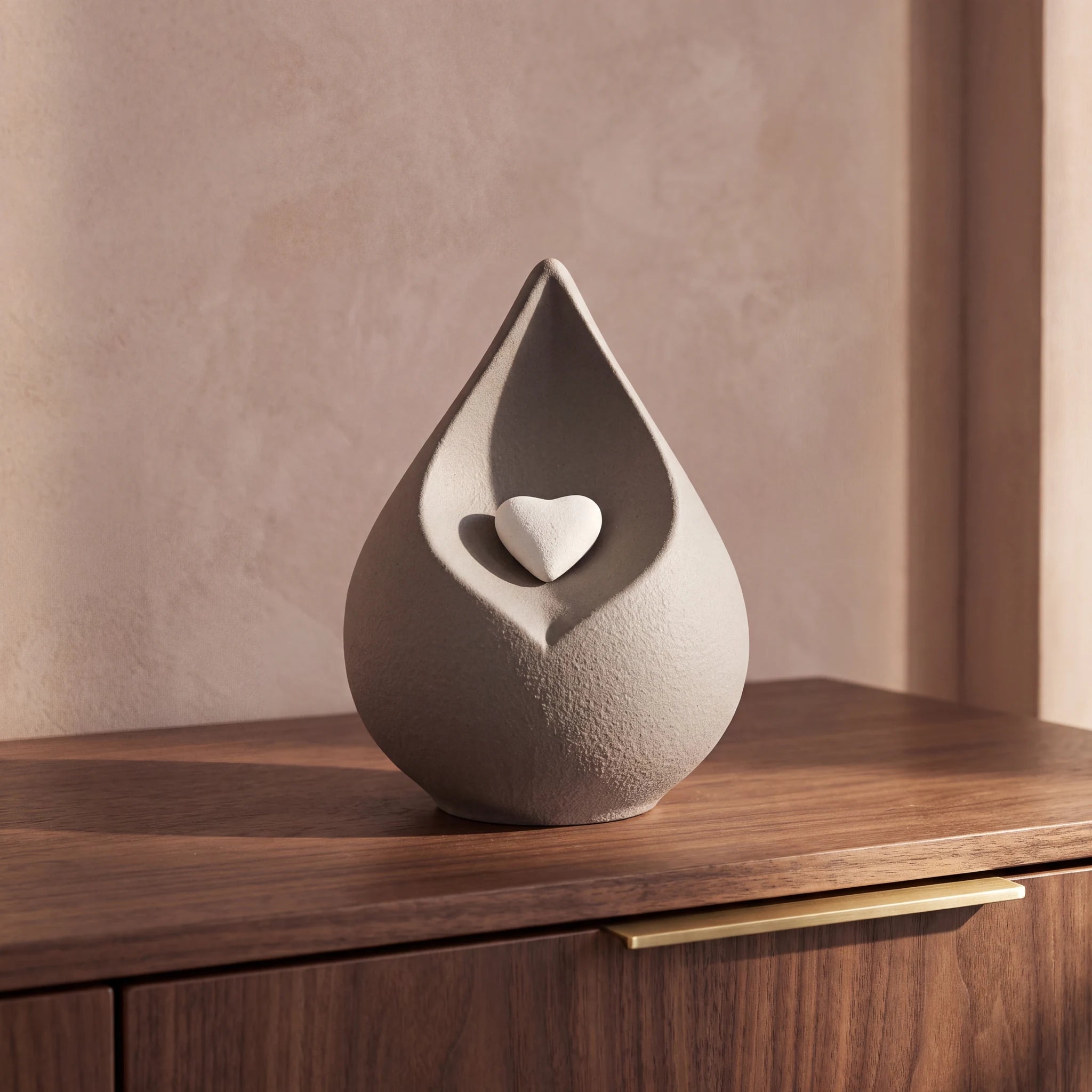 Teardrop-Small-Urn-for-Ashes-in-with-Heart-in-Grey-Walnut-Sideboard