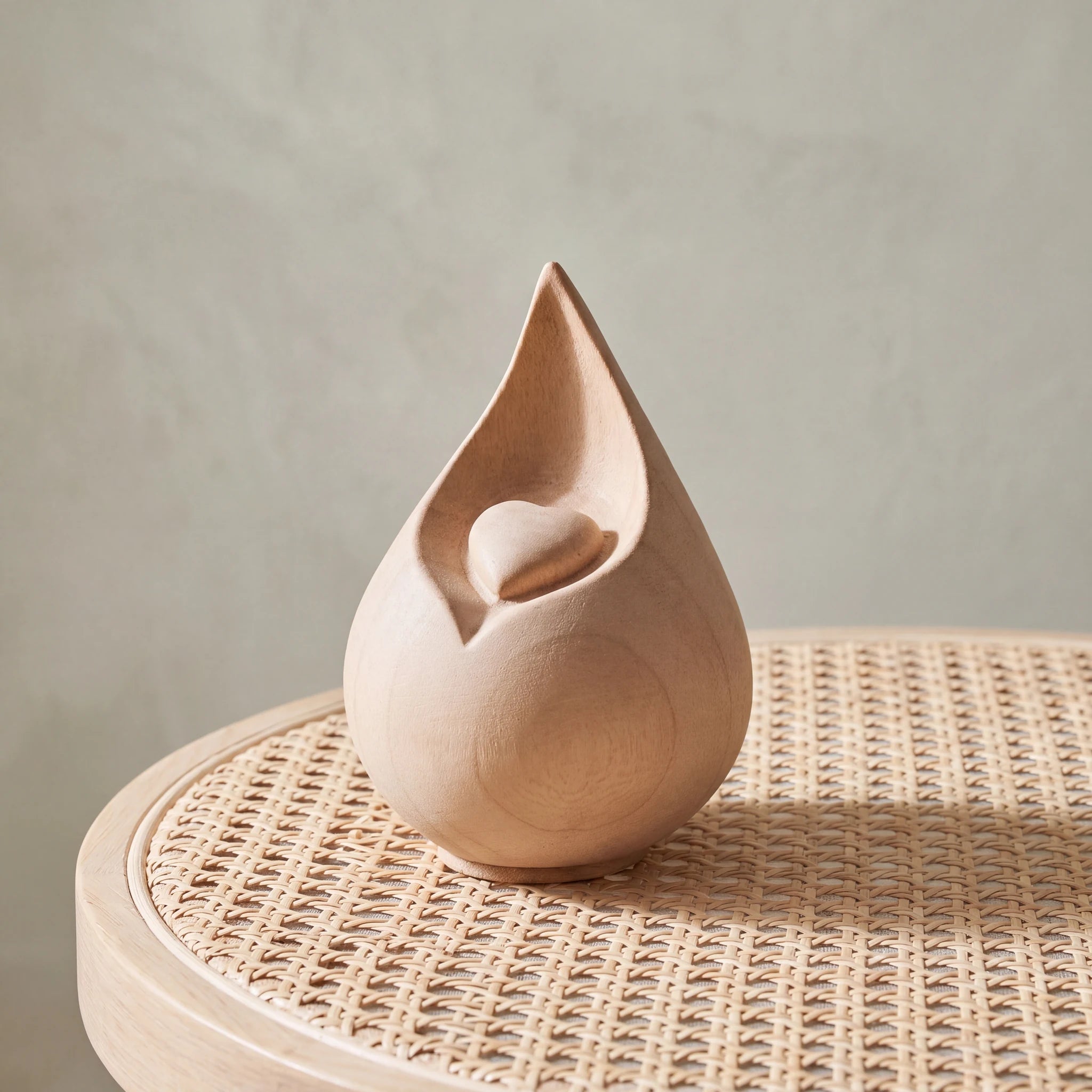 Teardrop-Small-Urn-for-with-Heart-Ashes-in-Natural-Wood-Cane-Table