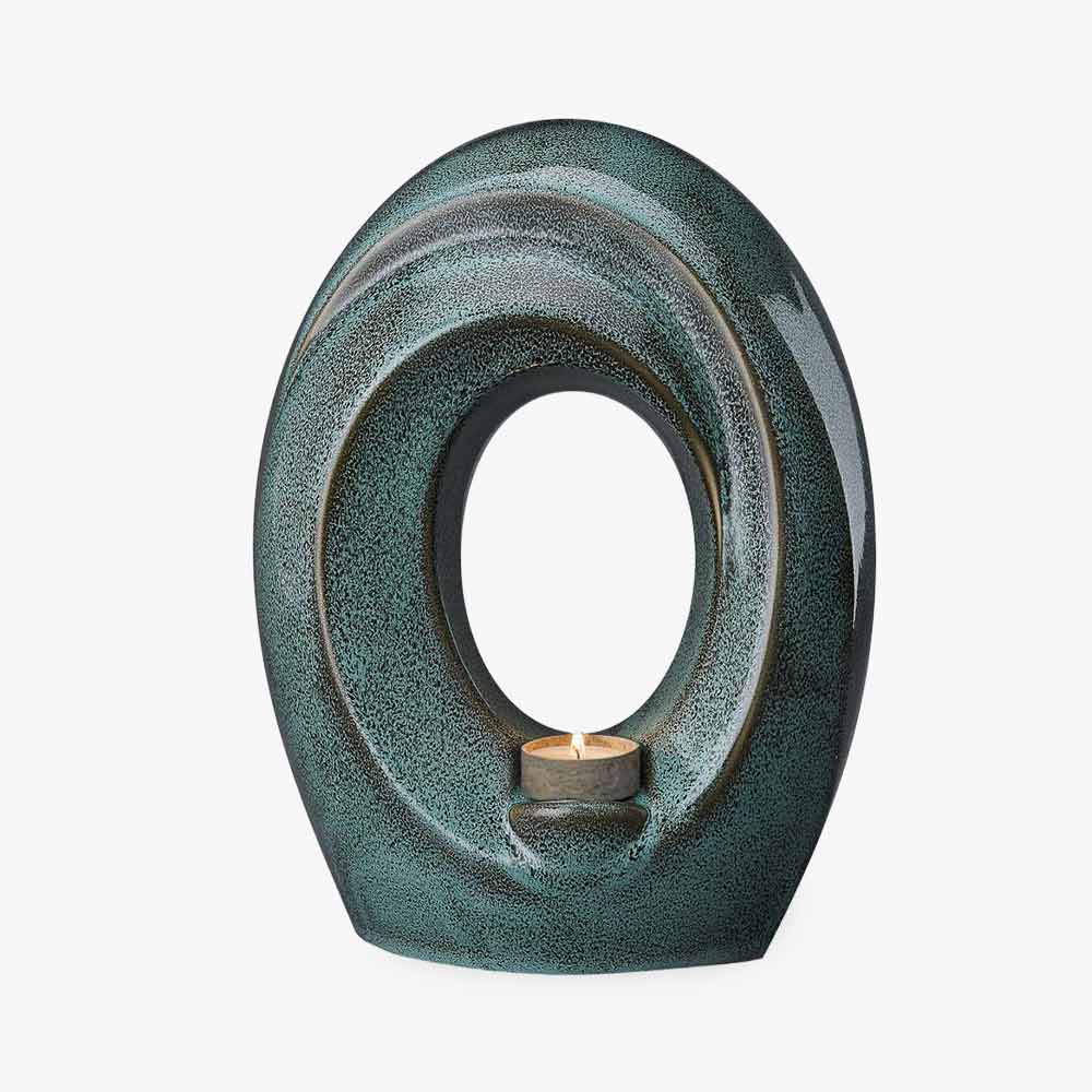 The Passage Adult Creamation Urn For Ashes in Oily Green Back View Studio Background