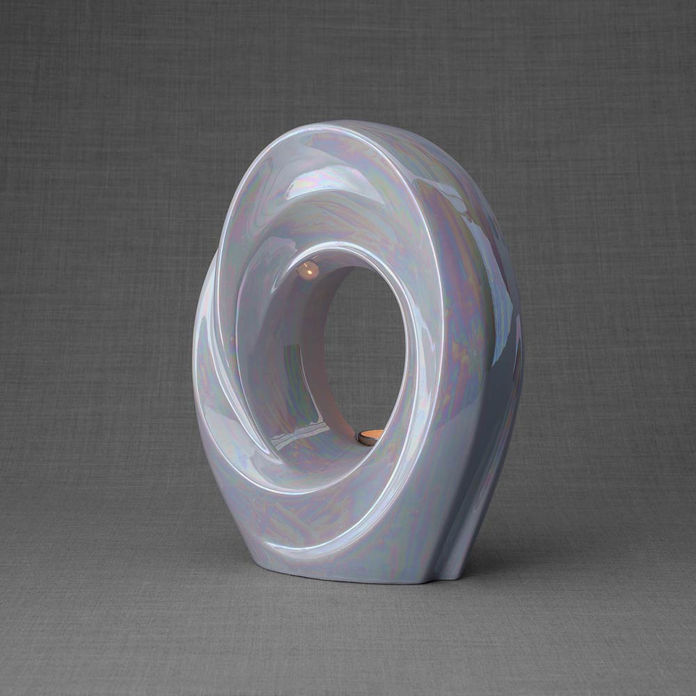 The Passage Adult Cremation Urn for Ashes in Pearlescent White Left Dark Background