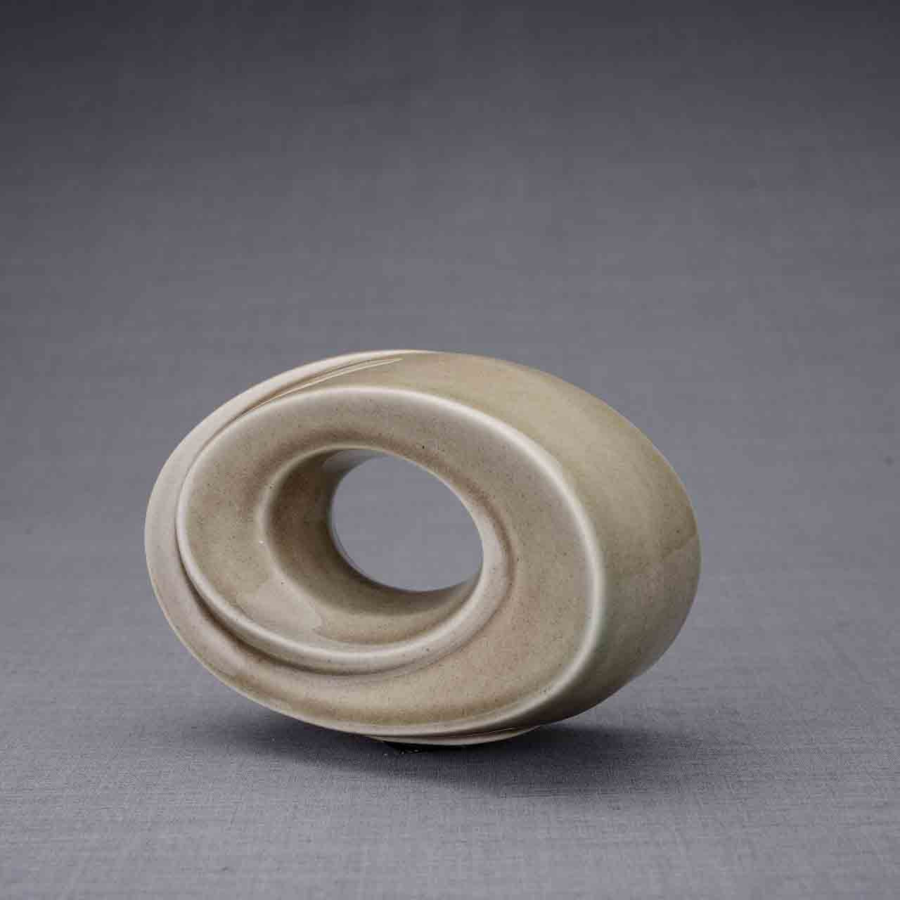 The Passage Ashes Keepsake Urn in Beige Grey Dark Background