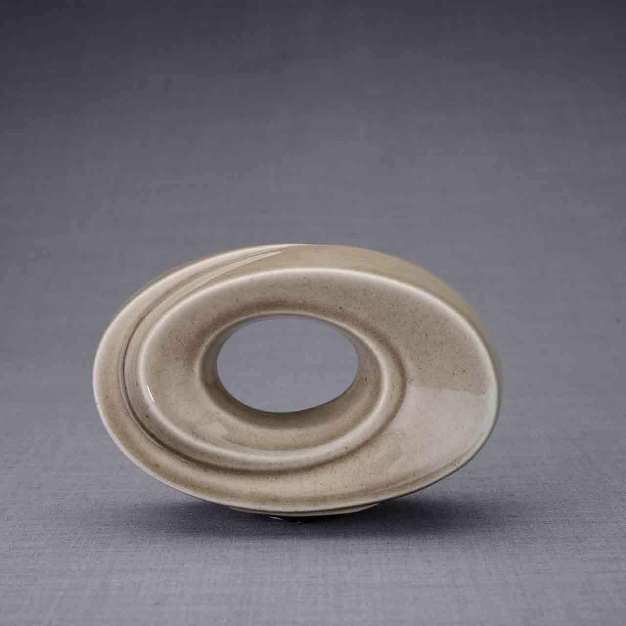 The Passage Ashes Keepsake Urn in Beige Grey Front Facing Dark Background