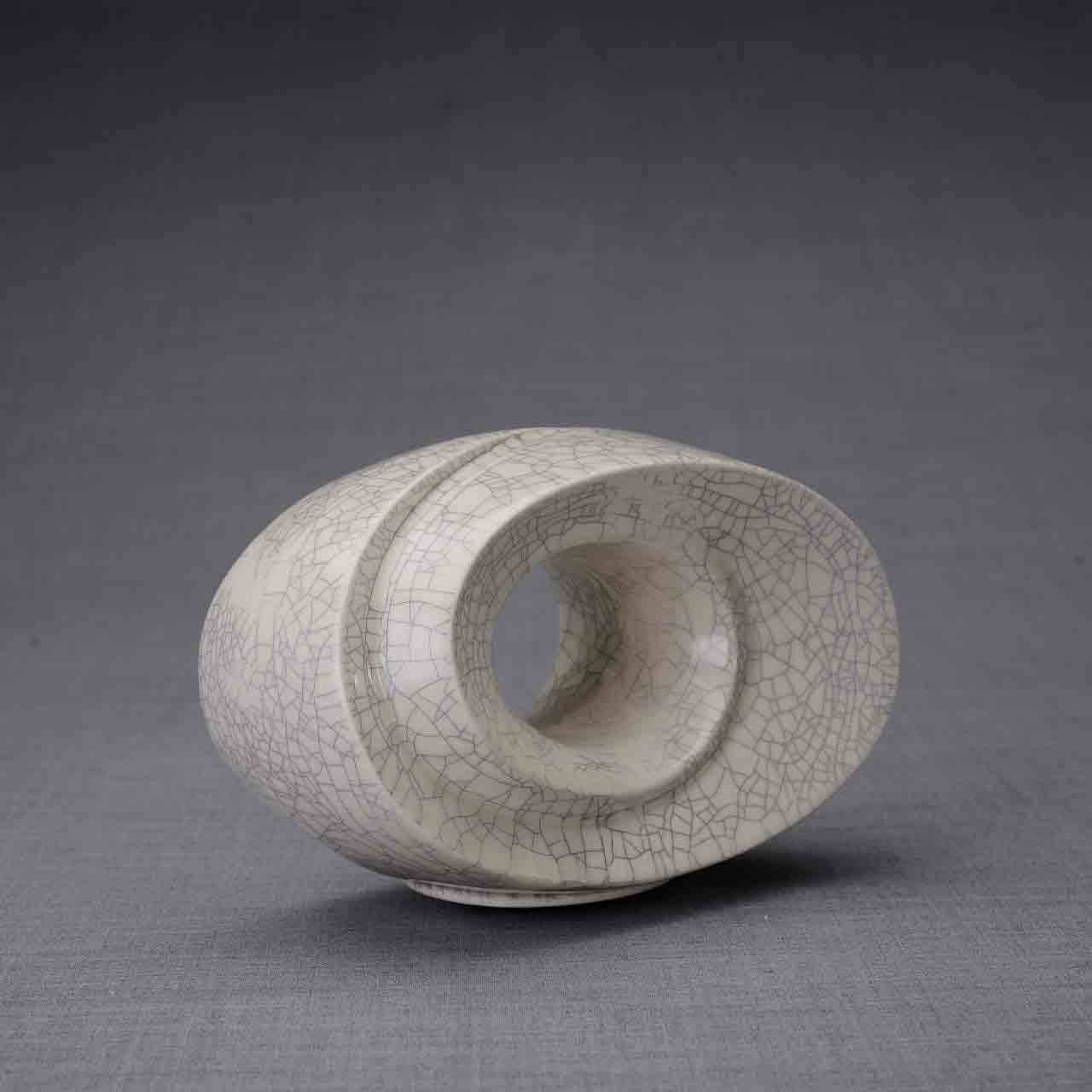 The Passage Ashes Keepsake Urn in Crackle Glaze Turned Right Dark Background