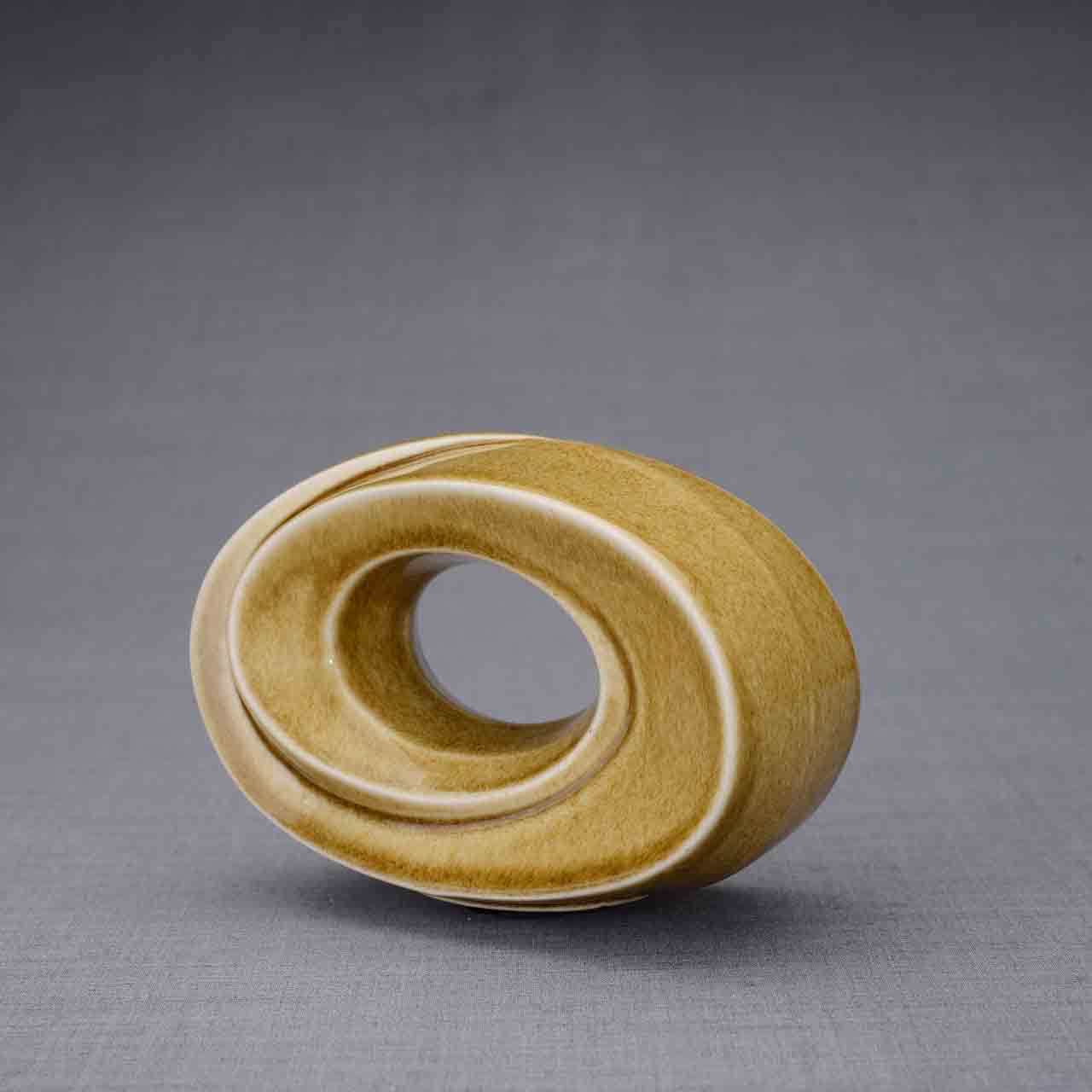 The Passage Ashes Keepsake Urn in Dark Sand Dark Background