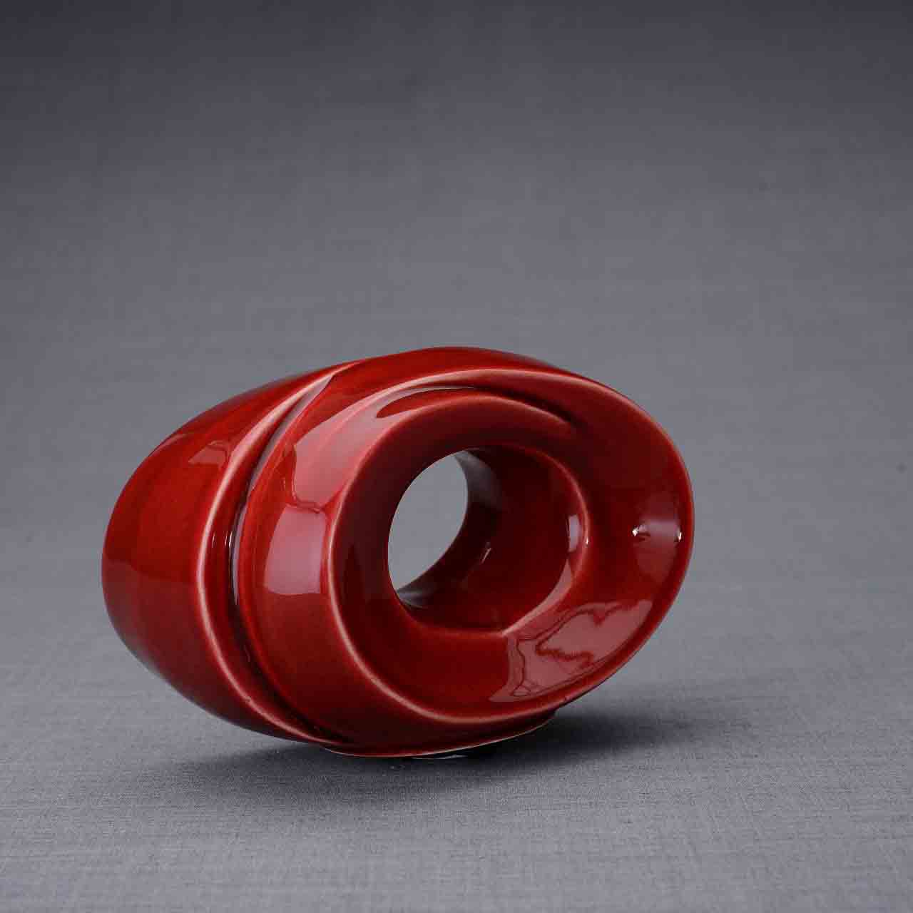 The Passage Ashes Keepsake Urn in Red Right Facing Dark Background