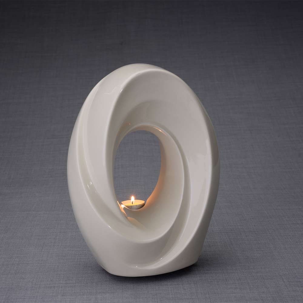 The Passage Cremation Urn for Ashes in Cream Turned Right Dark Background