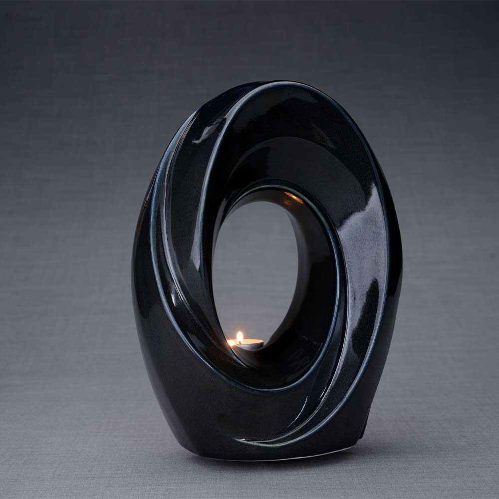 The Passage Cremation Urn for Ashes in Midnight Blue Turned Right Dark Background