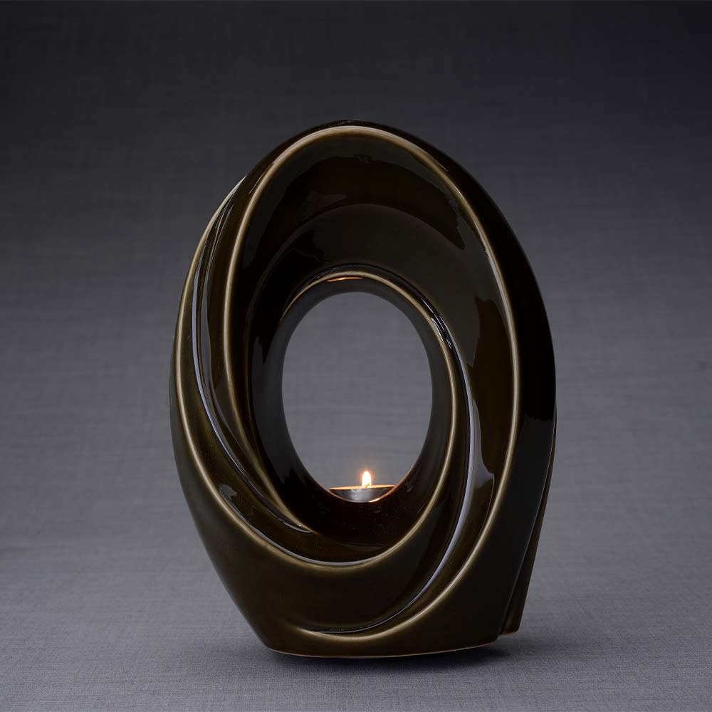 The Passage Cremation Urn for Ashes in Oily Brown Dark Background