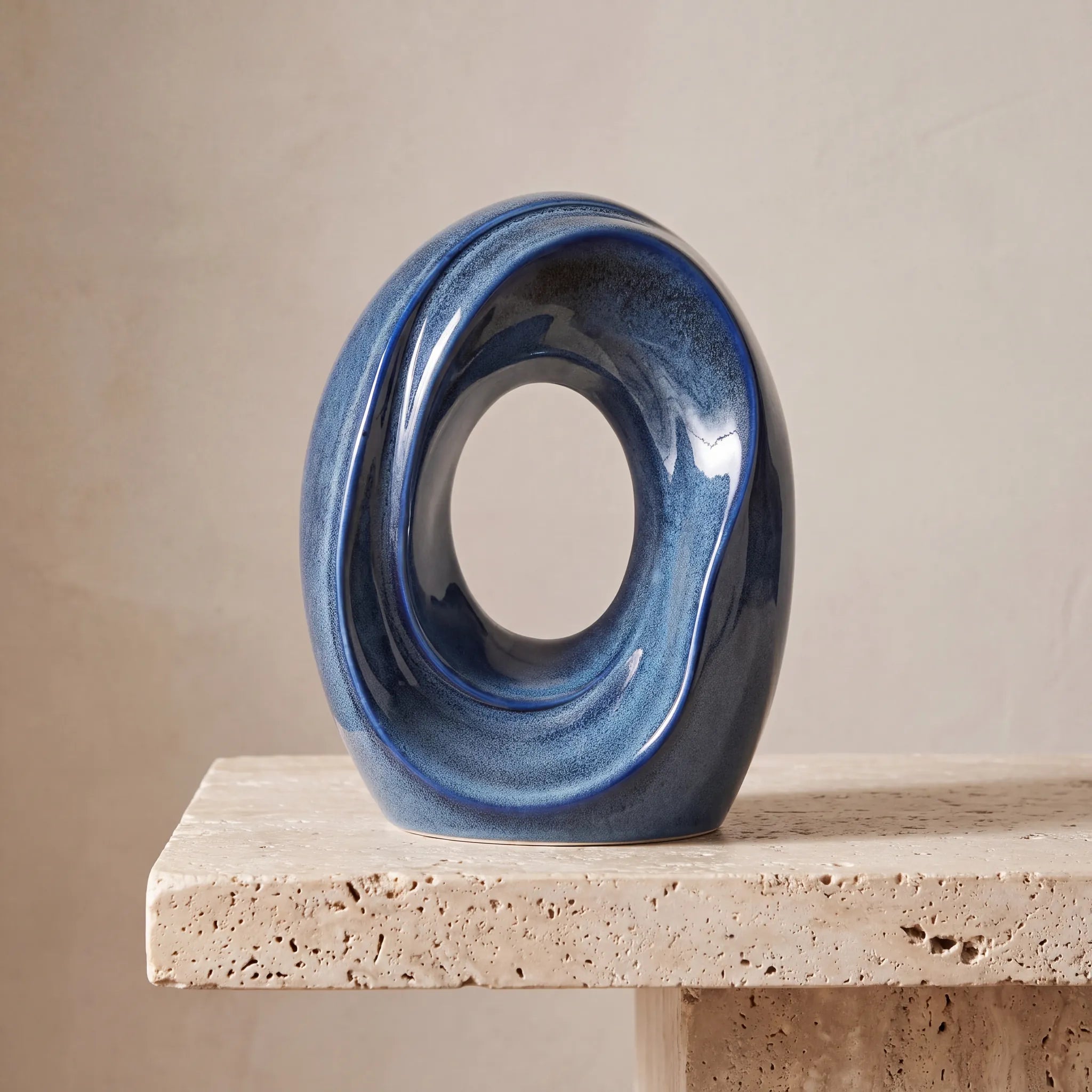 The-Passage-Medium-Urn-for-Ashes-in-Blue-Travertine-Ledge