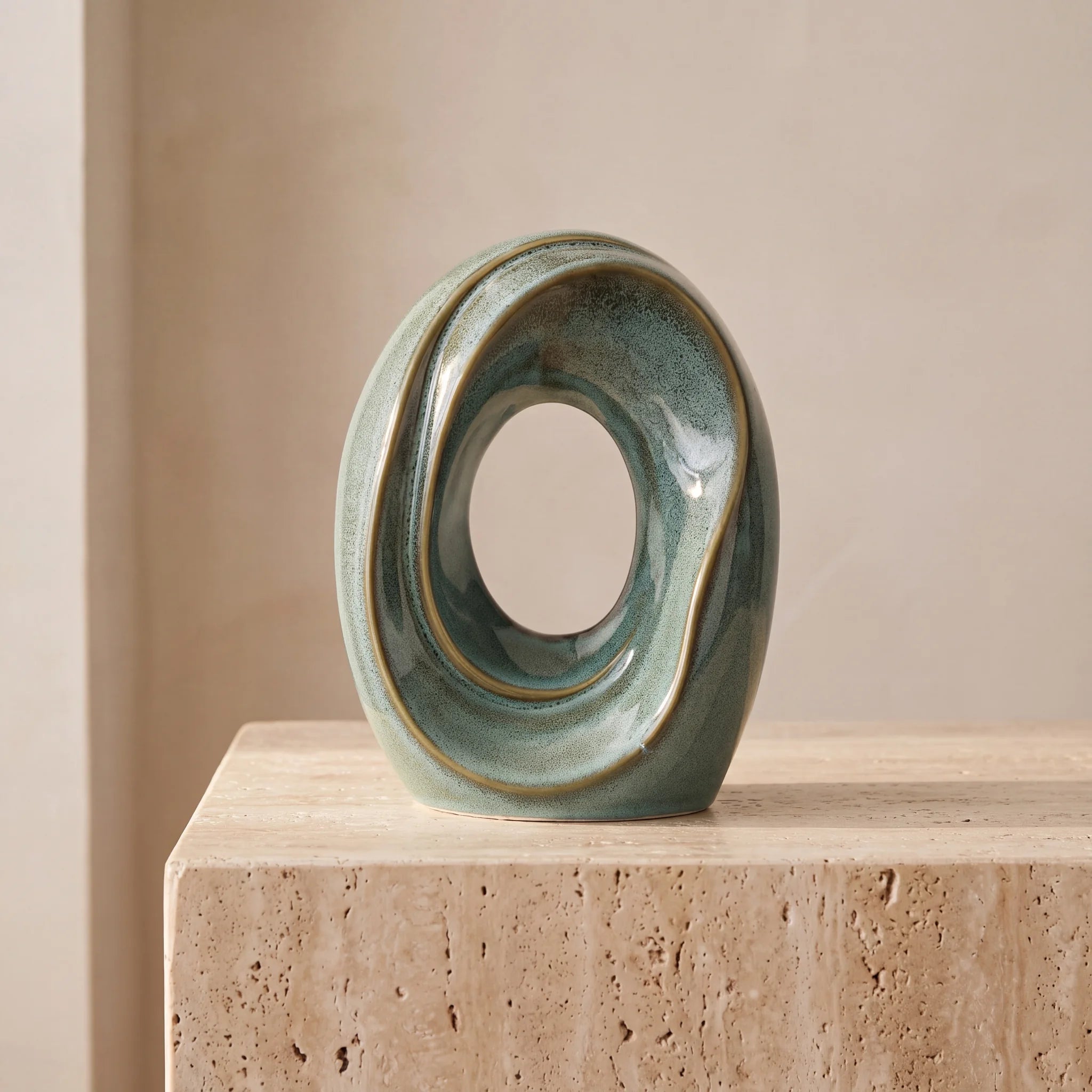 The-Passage-Medium-Urn-for-Ashes-in-Oily-Green-Travertine-Ledge