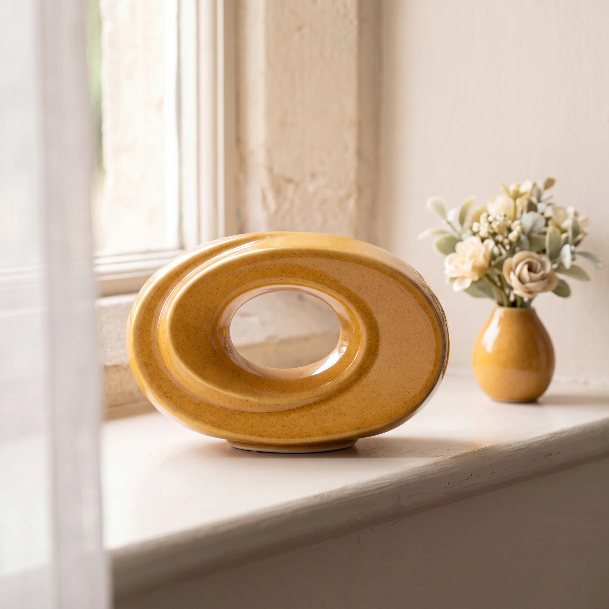 The-Passage-Small-Urn-for-Ashes-in-Amber-keepsake_windowsill_posy-Right-Angle