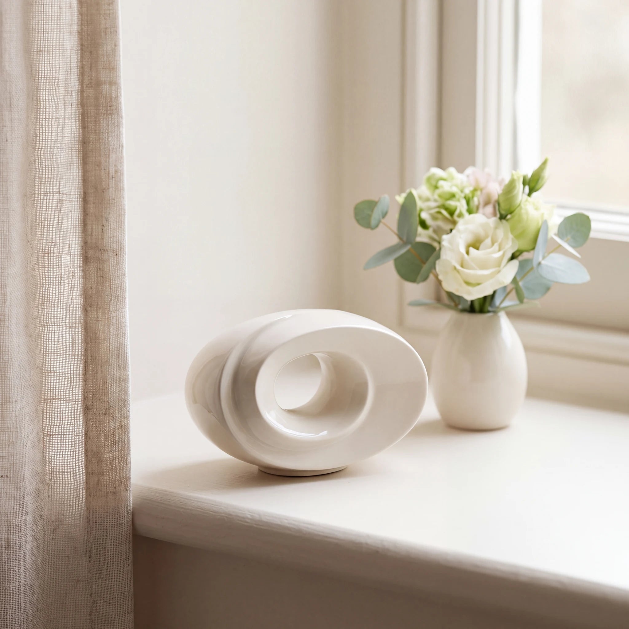 The-Passage-Small-Urn-for-Ashes-in-Cream-keepsake_windowsill_posy-Right-Angle