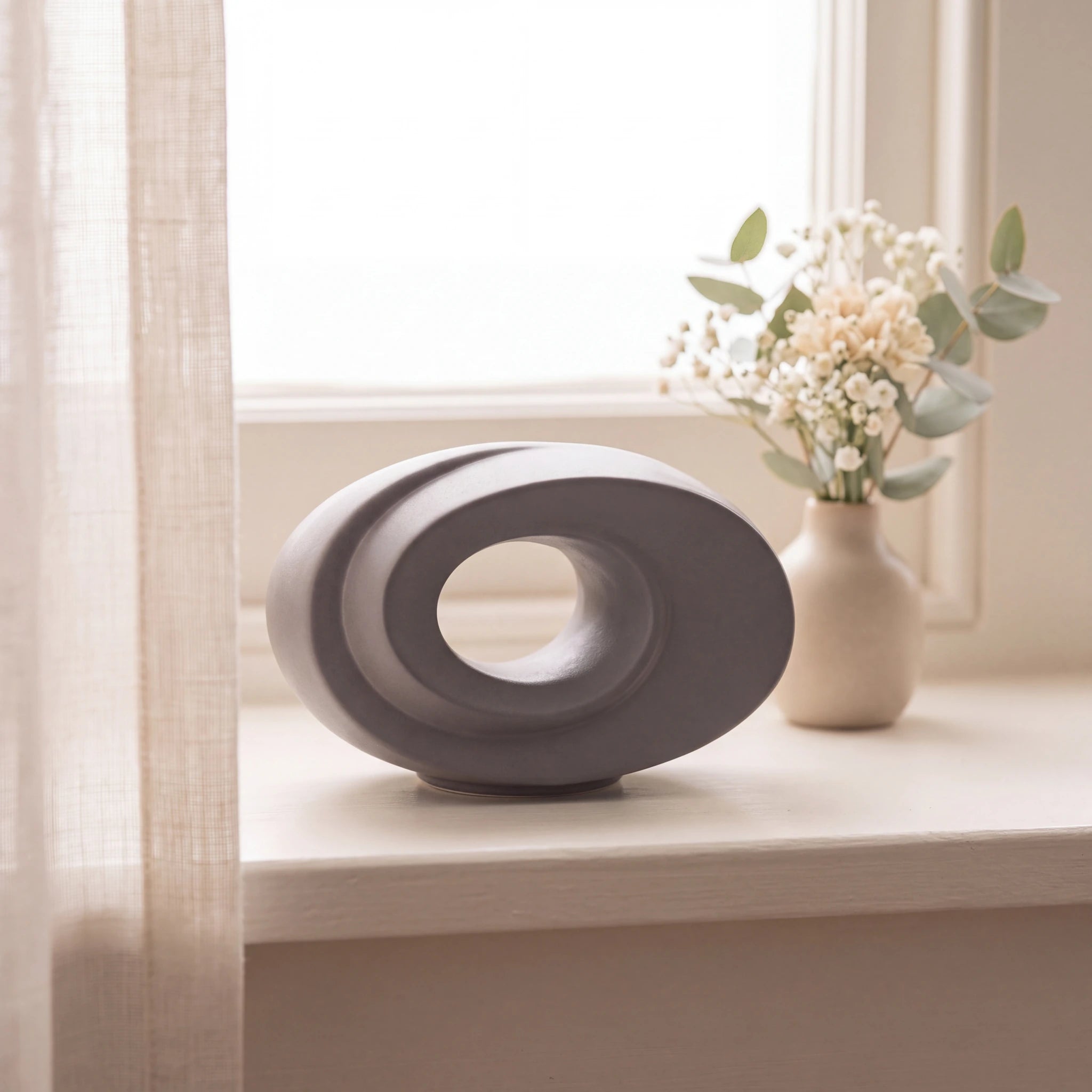 The-Passage-Small-Urn-for-Ashes-in-Matte-Grey-keepsake_windowsill_posy-Right-Angle