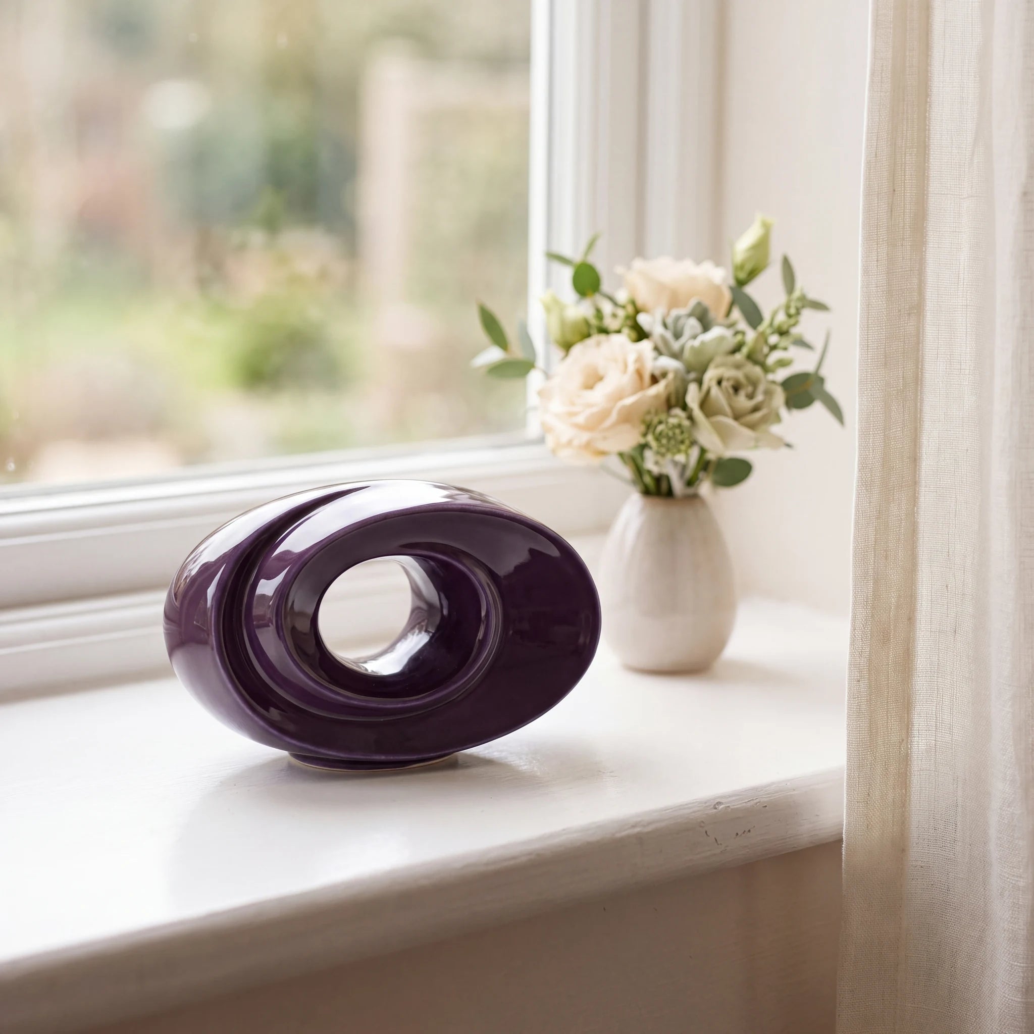 The-Passage-Small-Urn-for-Ashes-in-Purple-keepsake_windowsill_posy-Right-Angle