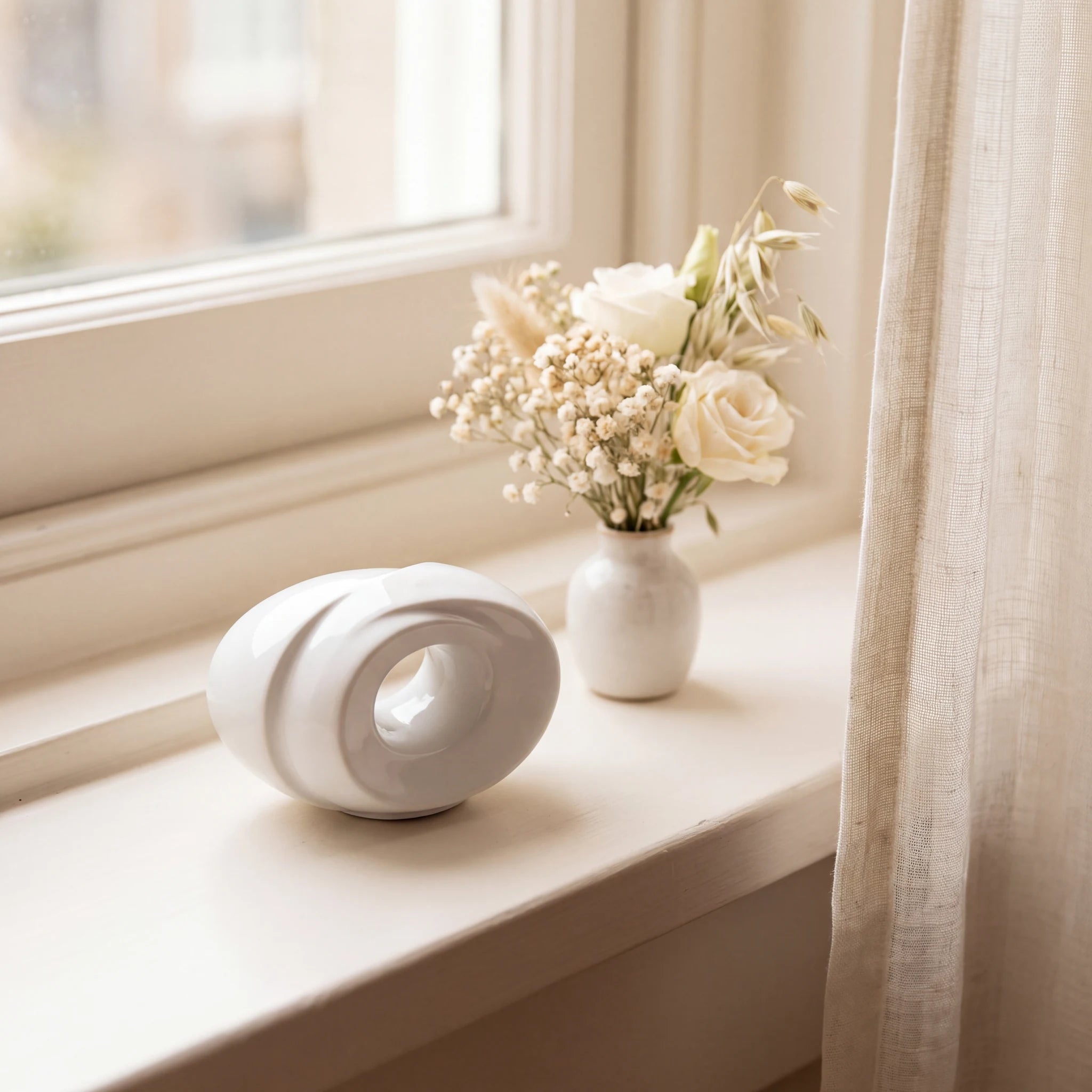 The-Passage-Small-Urn-for-Ashes-in-White-keepsake_windowsill_posy-Right-Angle