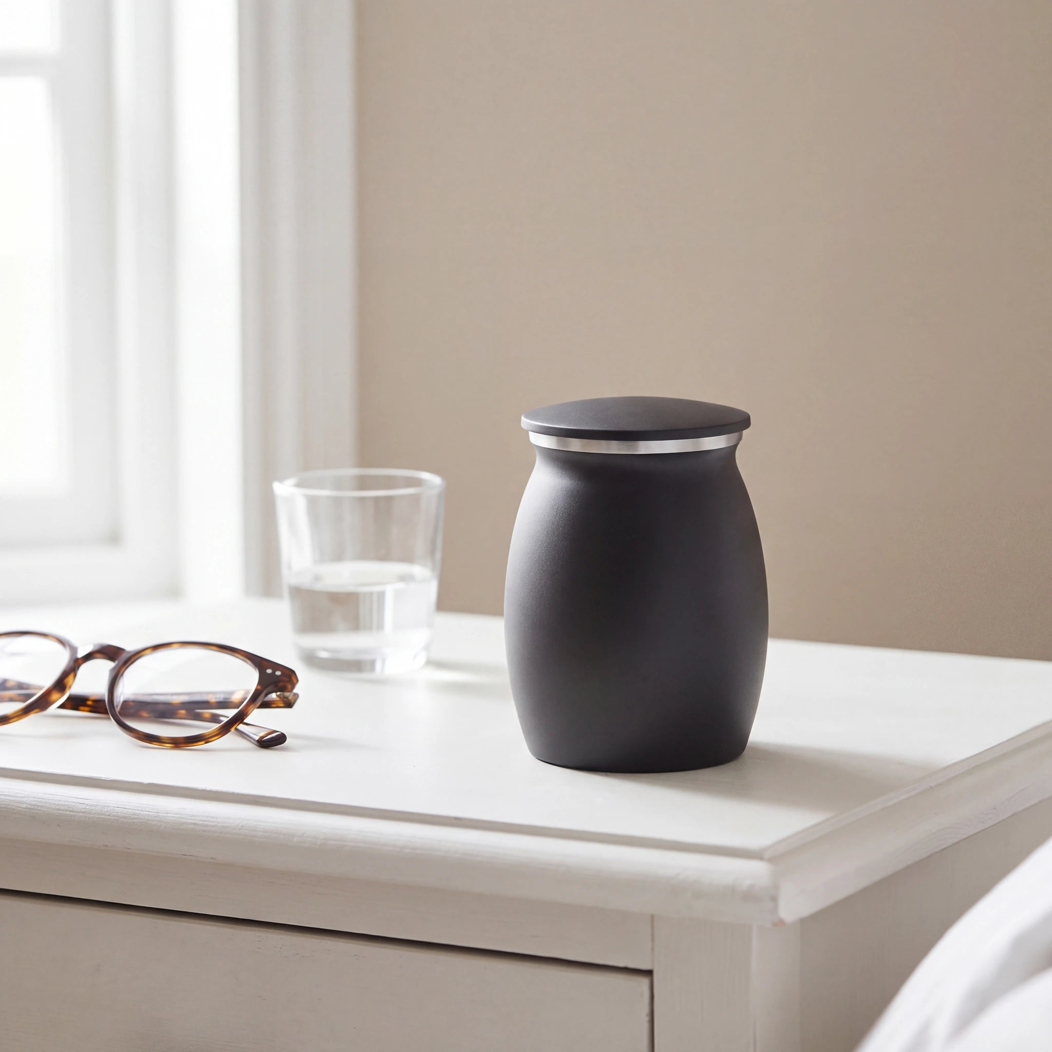 Tribute-Metal-Small-Urn-for-Ashes-in-Matte-Black-keepsake_bedside_glasses