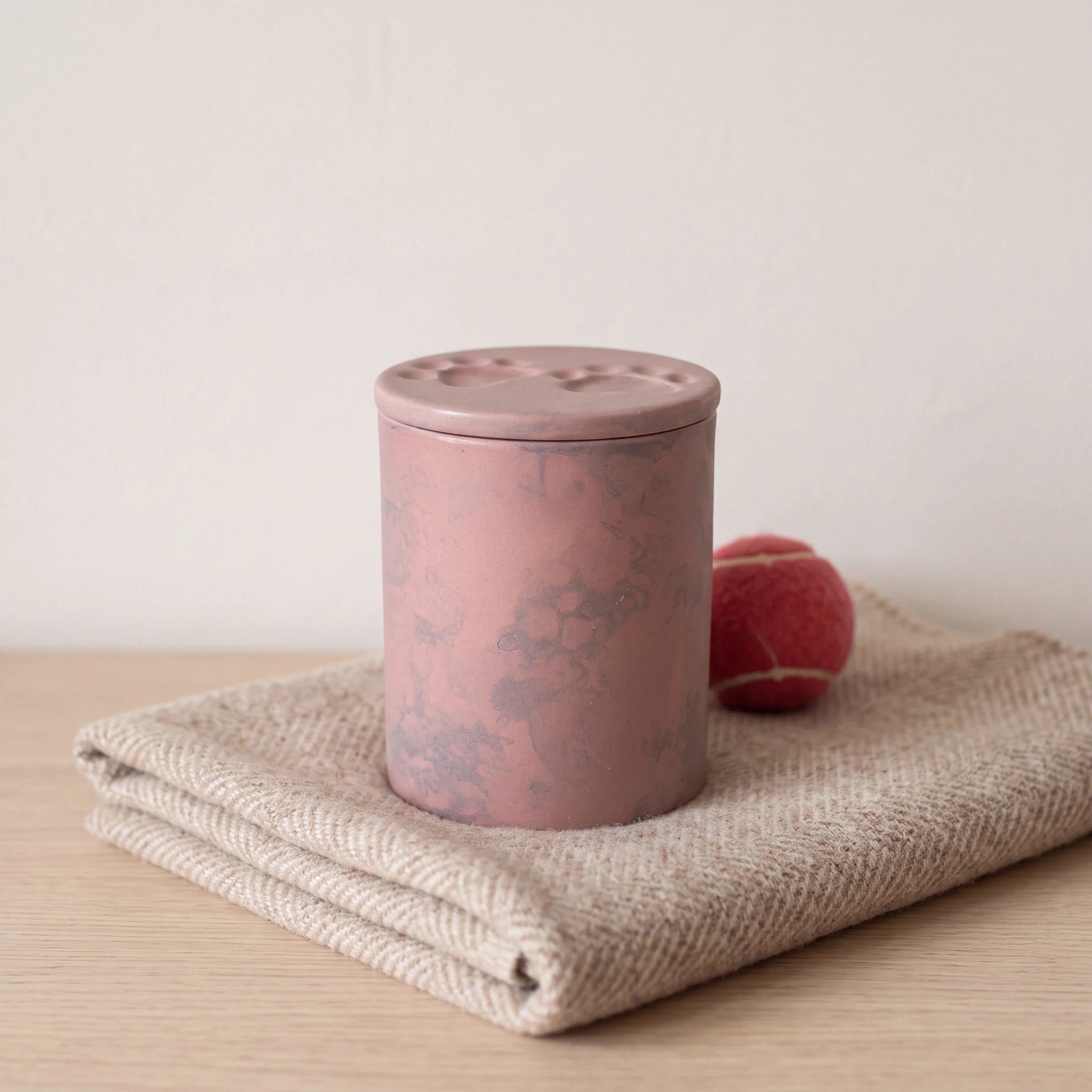 Two-Paws-Pet-Urn-for-Ashes-in-Pink-Sky-pet_blanket_fold