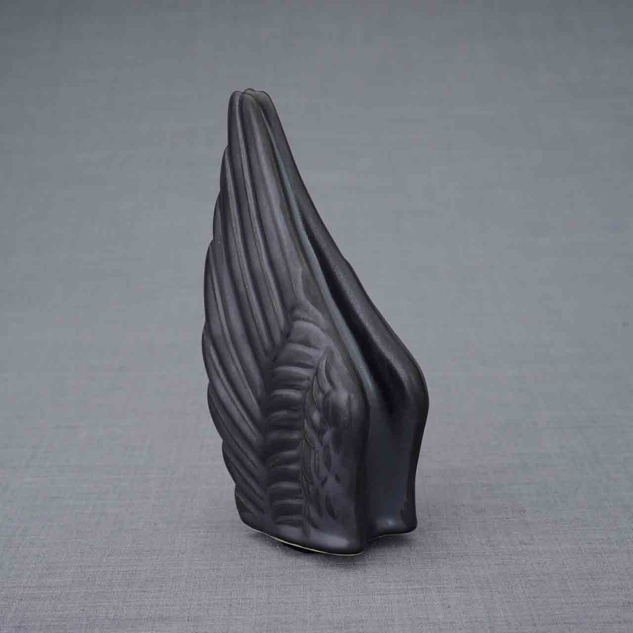 Wings Ashes Keepsake Urn in Matte Black Turned Left Dark Background