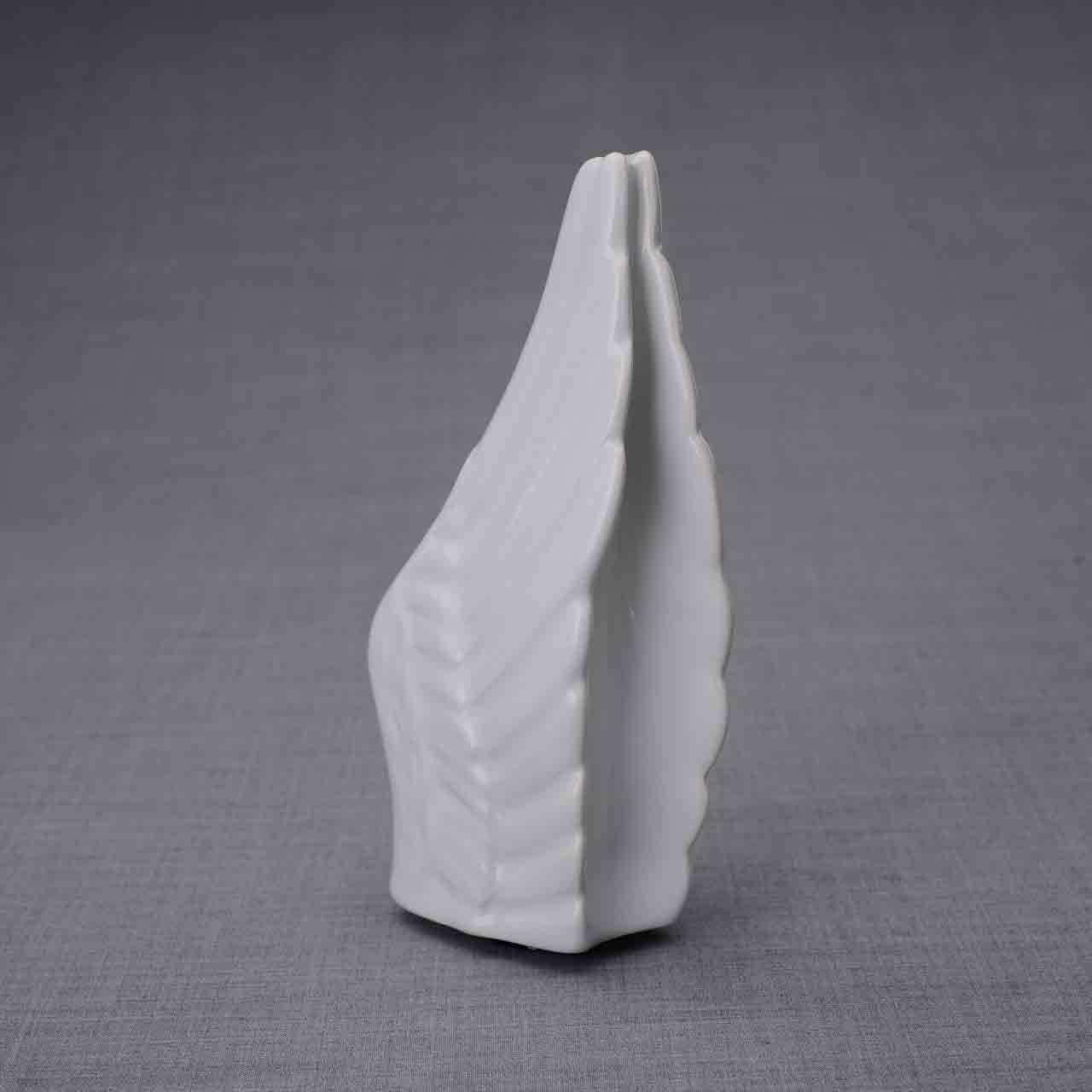 Wings Ashes Keepsake Urn in White Dark Background