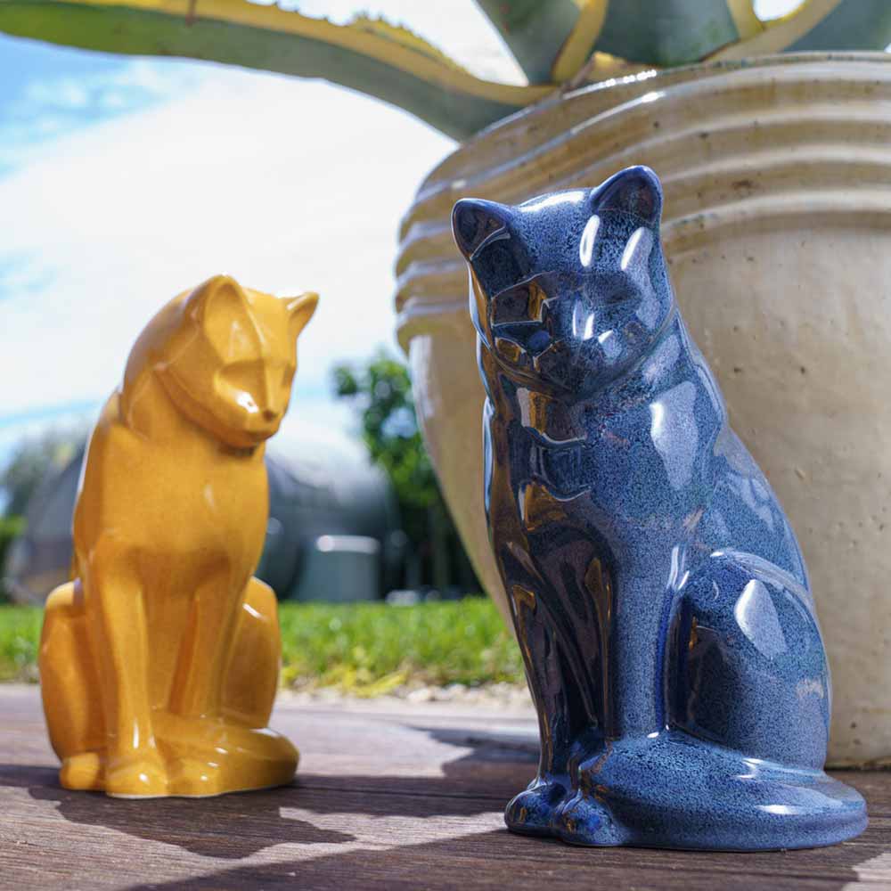 Cat Urns For Ashes Amber And Blue Outside Together In The Sun