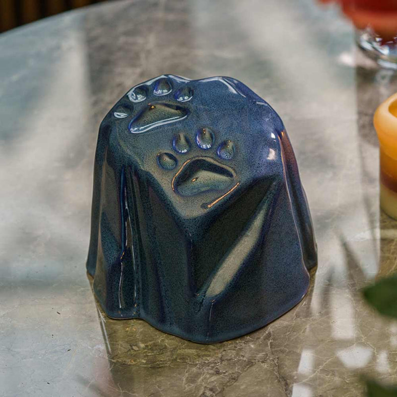 Paw Prints Dog Urn For Ashes Blue On Table Close Up