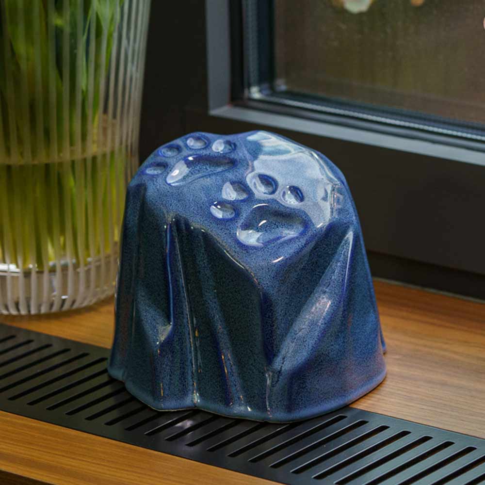 Paw Prints Dog Urn For Ashes Blue On Table On Shelf