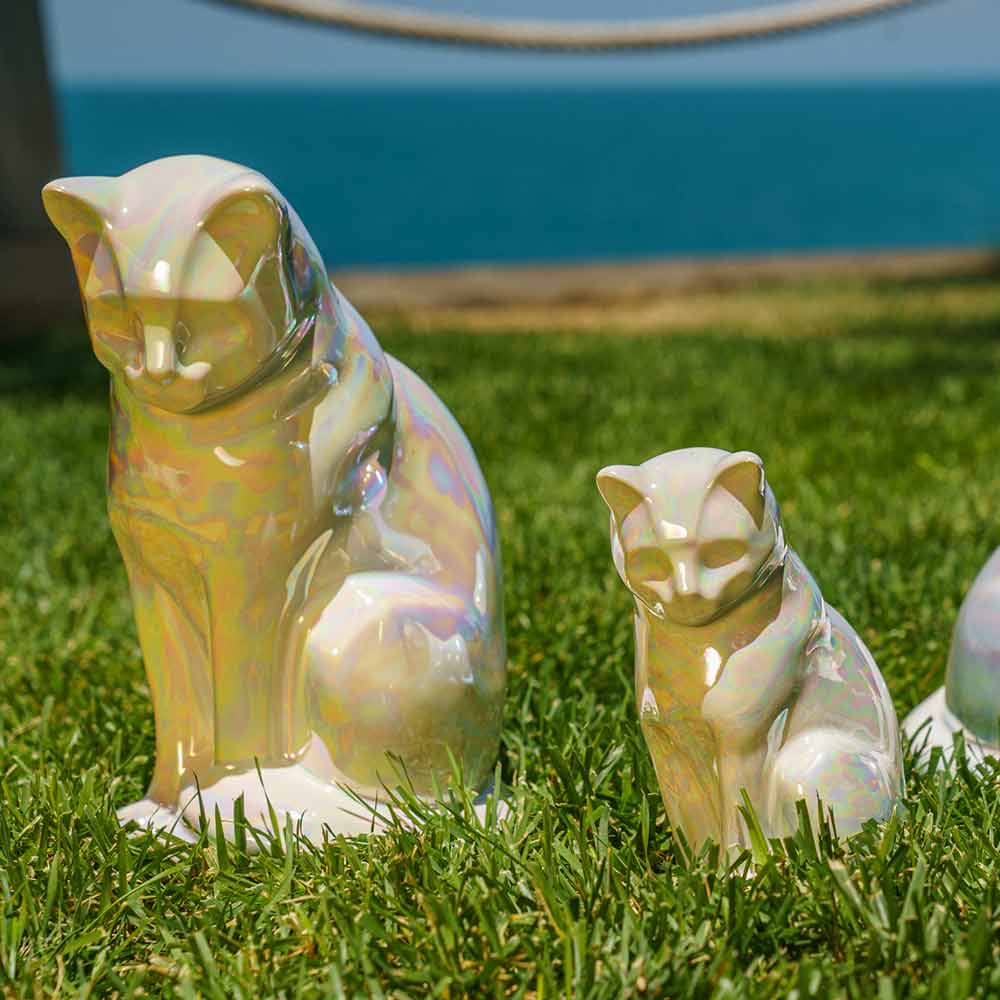 Pearly White Cat Urns For Ashes Outside In The Grass