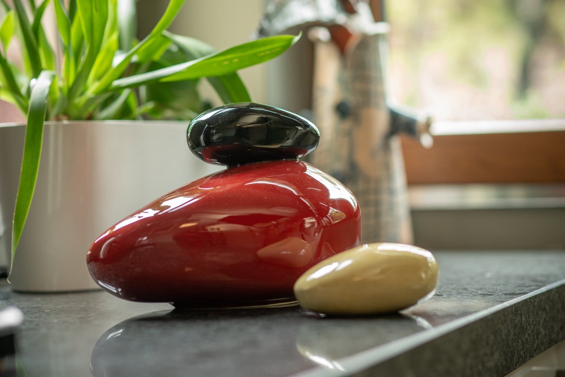 Pebbles Adult Cremation Urn for Ashes in Oily Green