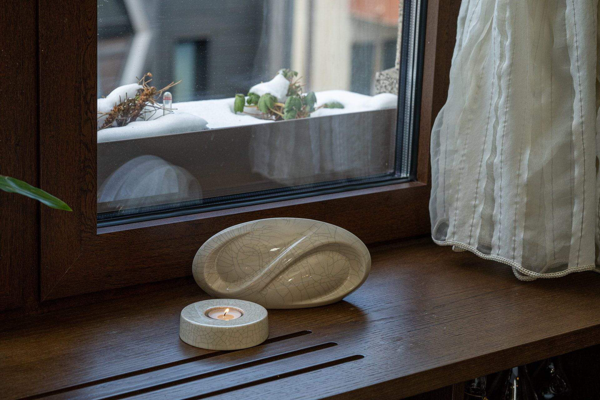 Caleo Candle Holder for Cremation Urns in Light Sand