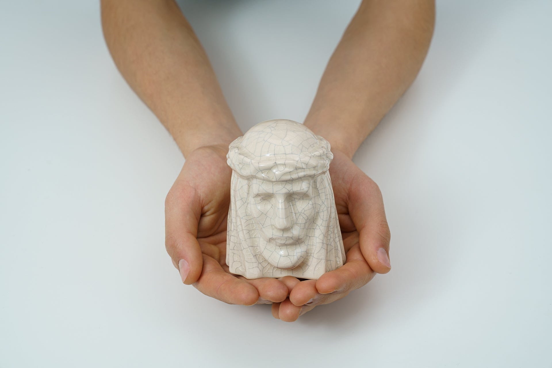 The Christ Mini Urn for Ashes in Light Sand