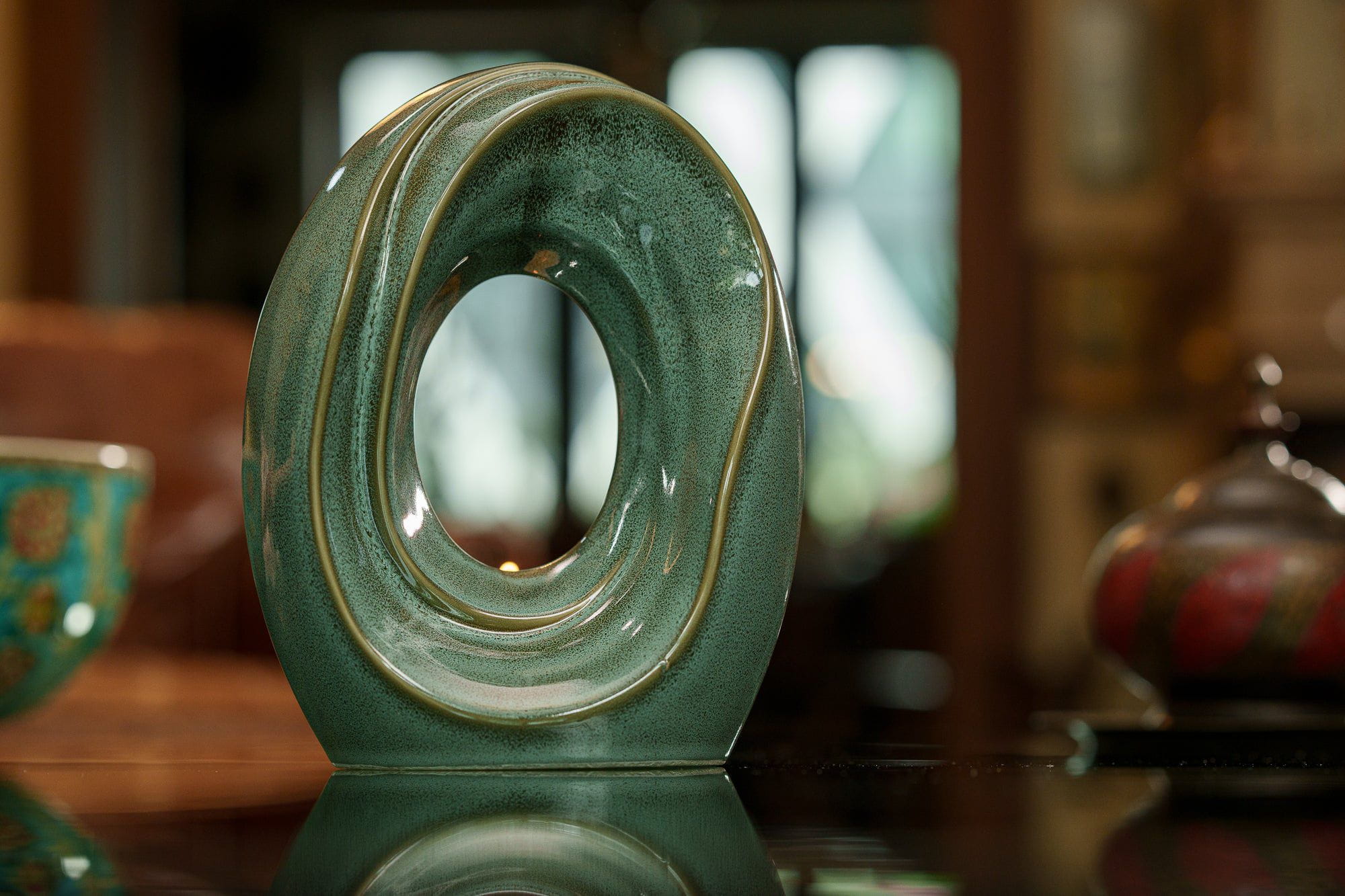 The Passage Medium Urn for Ashes in Oily Green