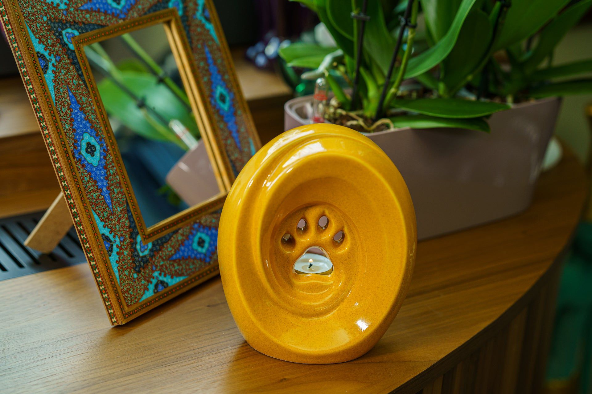 Paw Pet Urn for Ashes in Amber Yellow